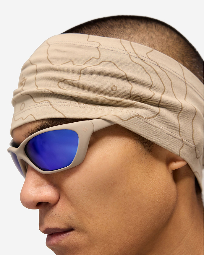 Front product image of a mens grey headband on a plain white background | 247 Contour Headband in Pebble | Soft running headband with reflective contour design | 247 Accessories | Represent Clo