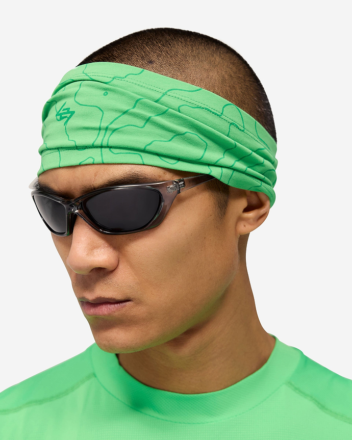 Product image of a mens green headband on a plain white background | 247 Contour Headband in Speed Green | Headband with reflective contour design | 247 Accessories | Represent Clo