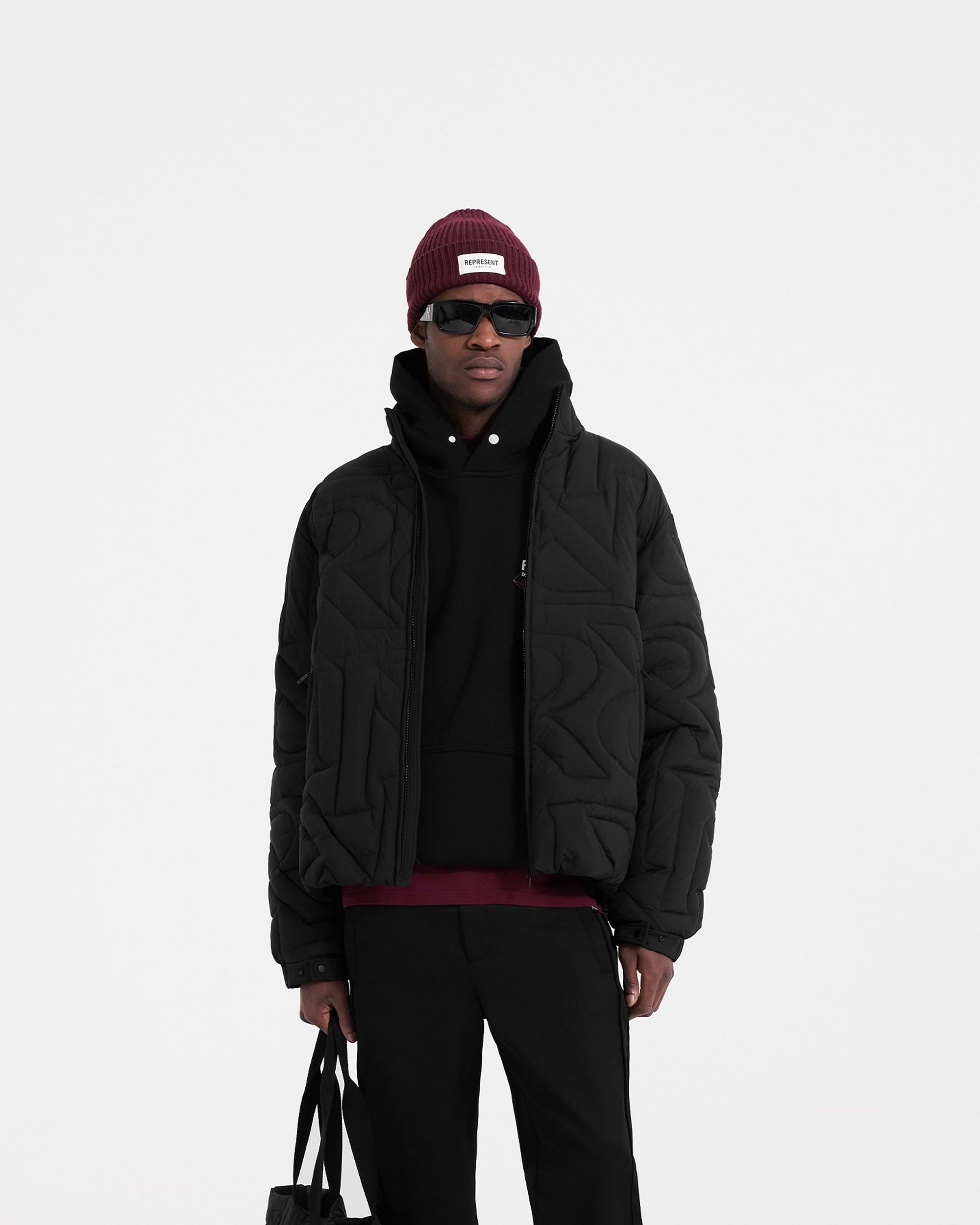 Initial Puffer Jacket | Black Outerwear PRE-SS23 | Represent Clo