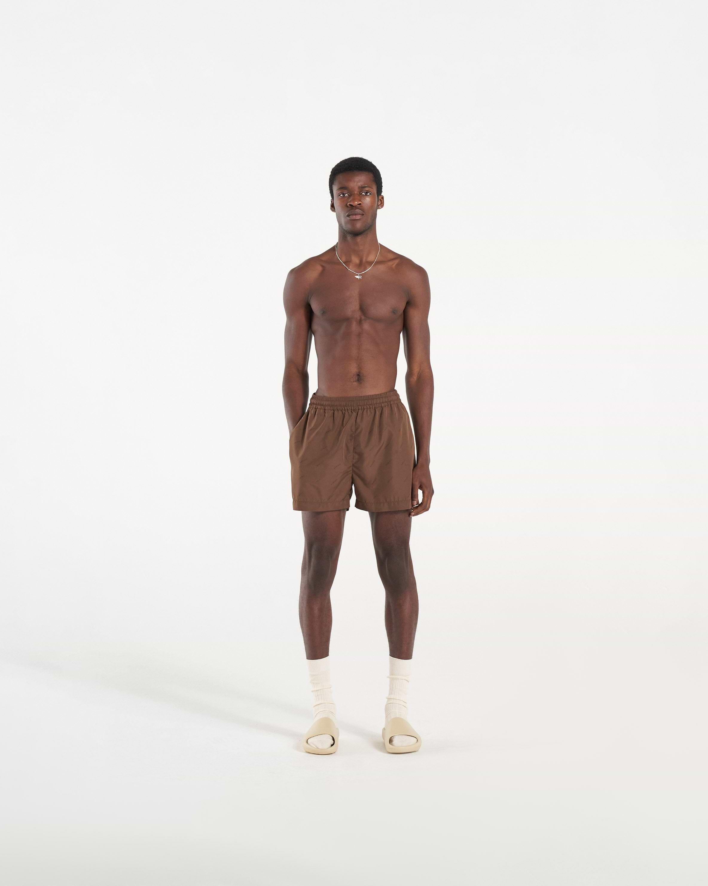 Brown swim shorts sales