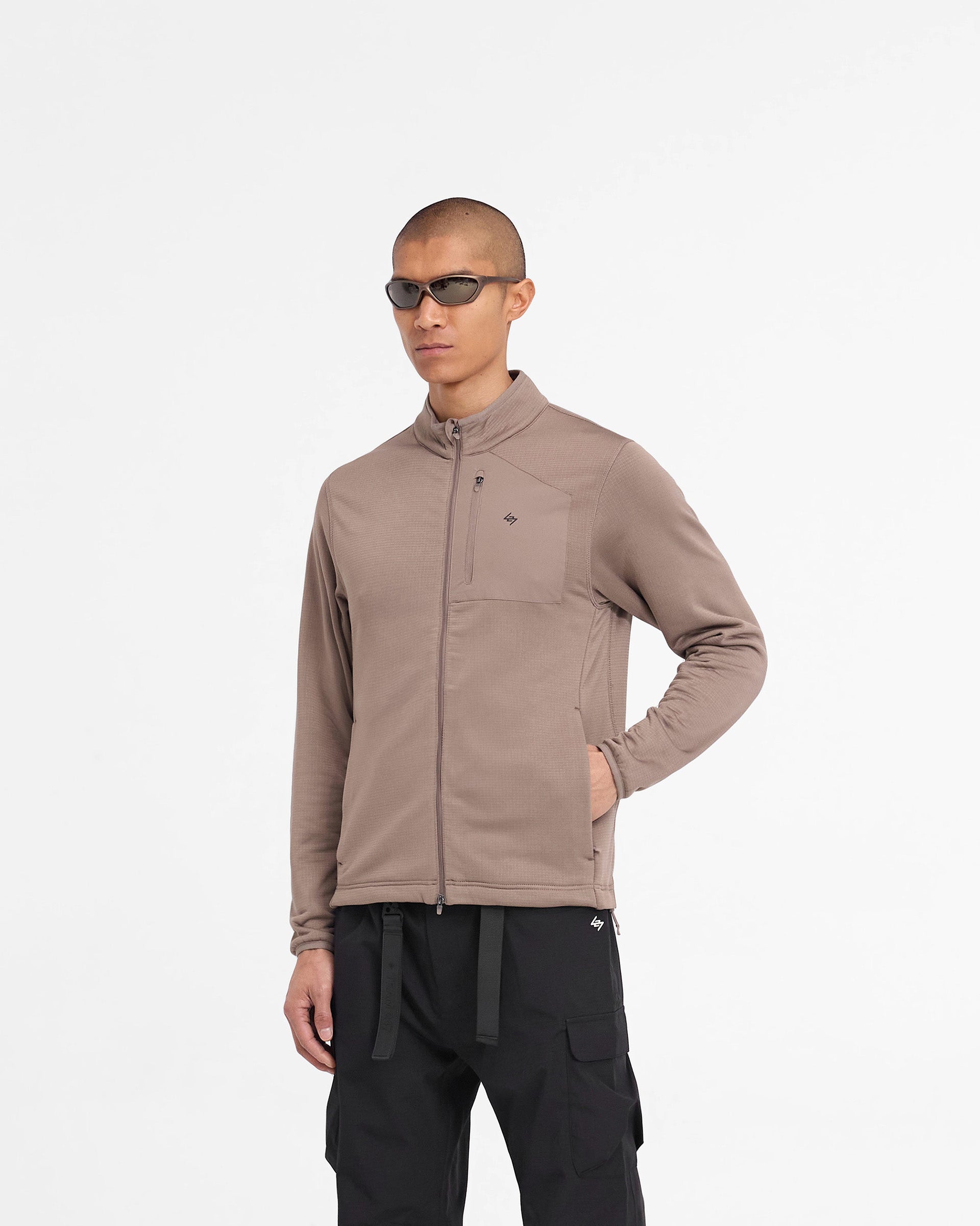 Back product image of a mens brown fleece jacket on a plain white background | 247 Full Zip Fleece in Umber | Fleece with adjustable hem and zip pocket | 247 Outerwear | Represent Clo