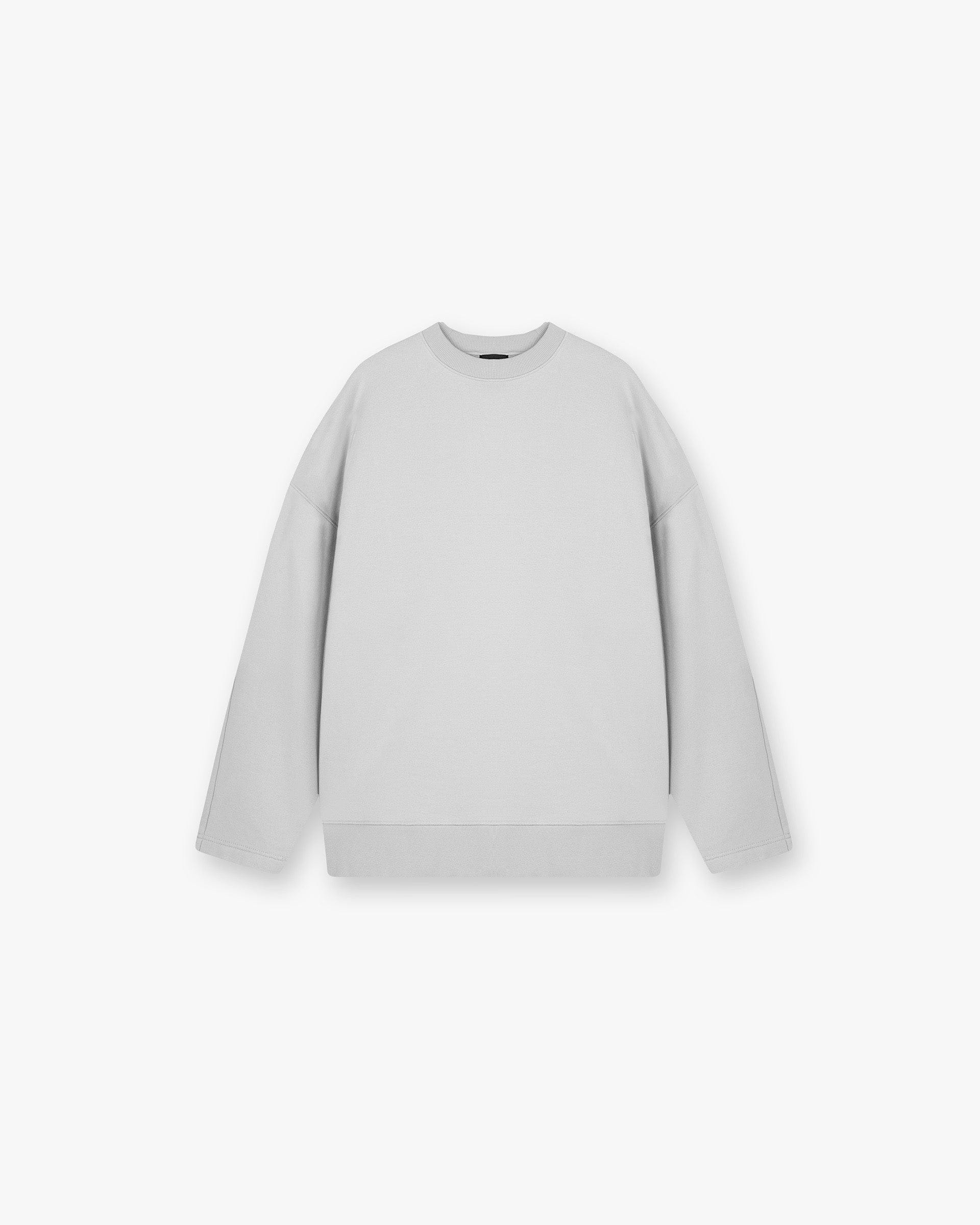 Front product image of a womens light grey sweater on a plain white background | Epic Raglan Sweater in Light Grey | Jersey vintage grey sweater | SS25 Sweaters | Represent Clo