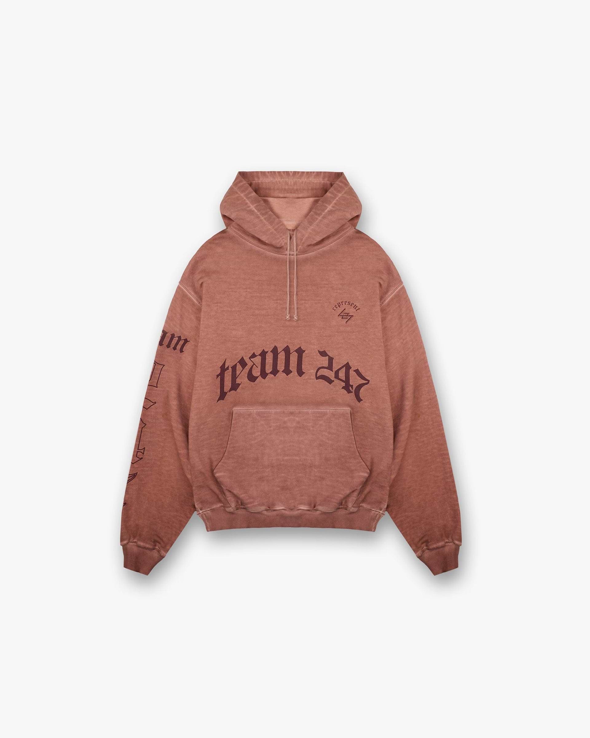 Front product image of a mens rust hoodie on a plain white background | WG247 Hoodie in Rust | Hoodie with ribbed cuffs and adjustable drawstring hood | 247 Hoodies | Represent Clo