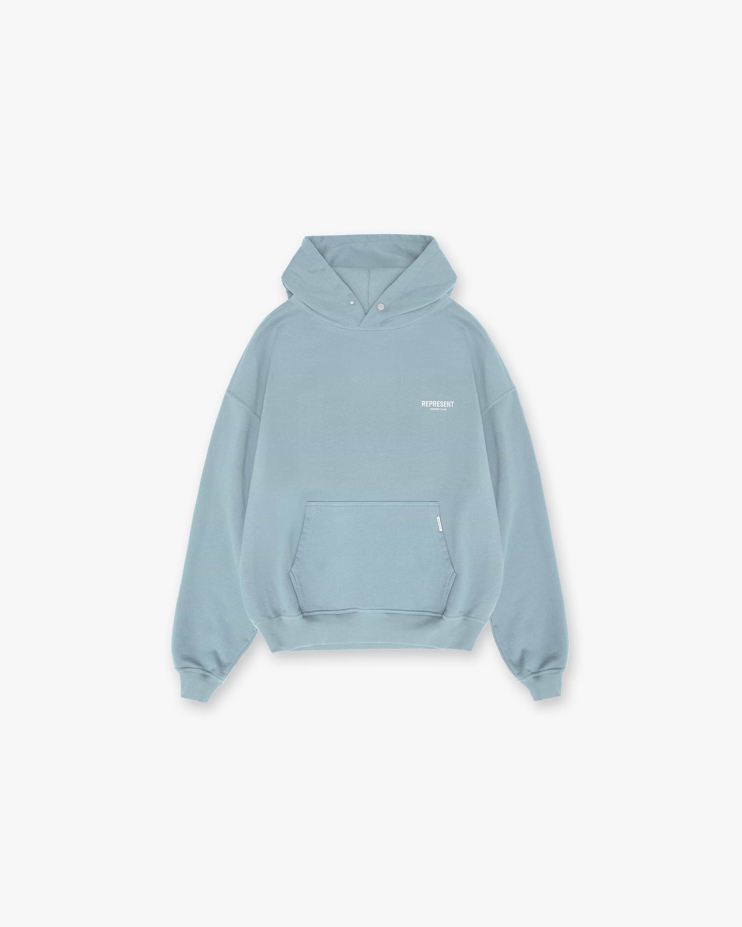 Back product image of a mens blue hoodie on a plain white background | Represent Owners Club Hoodie in Powder Blue | Heavyweight cotton hoodie with ribbed hem and Cobrax popper | Owners Club Hoodies | Represent Clo