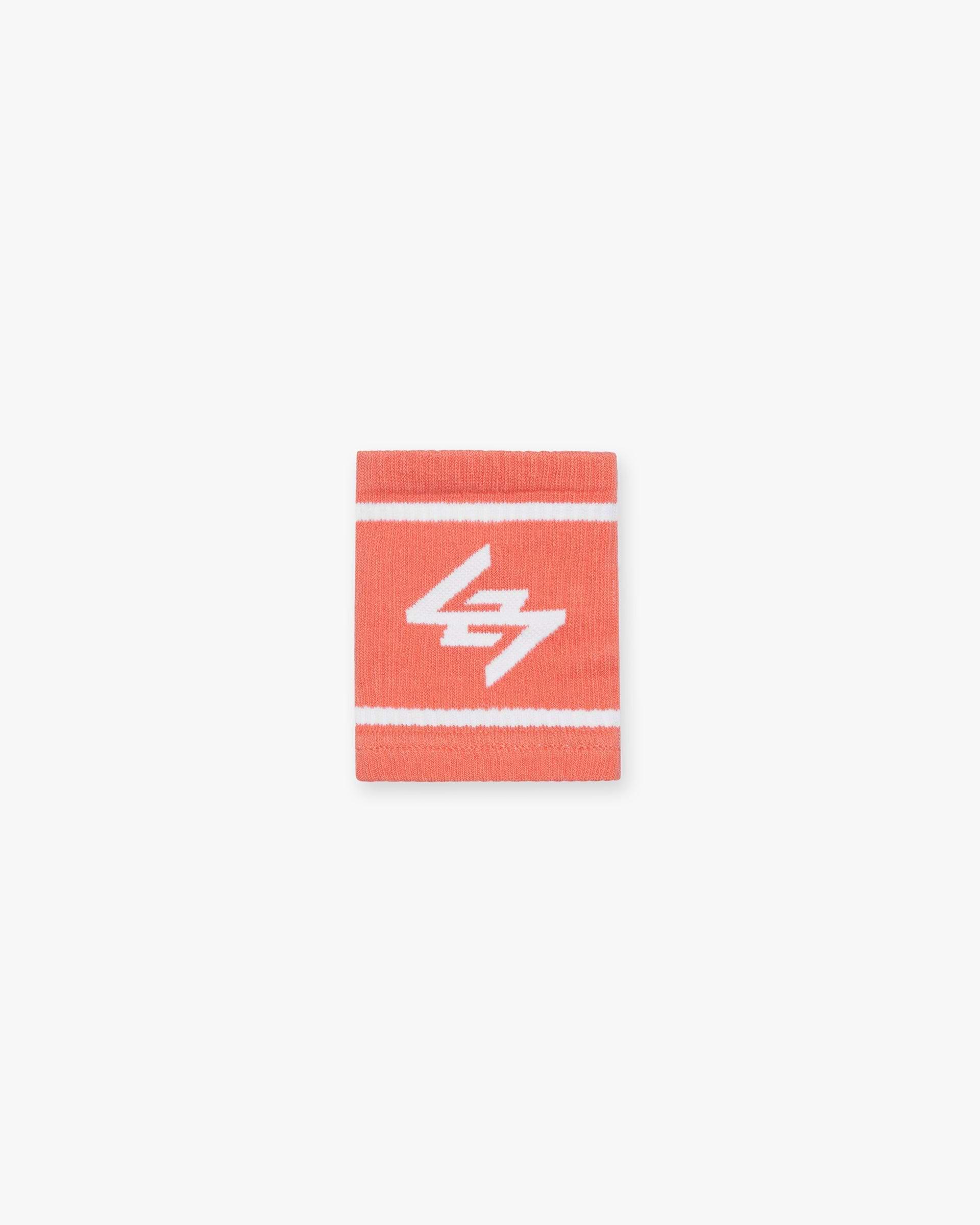 Back product image of mens coral wristbands on a plain white background | 247 Logo Wrist Bands in Coral | Cotton wristbands with 247 logo | 247 Accessories | Represent Clo