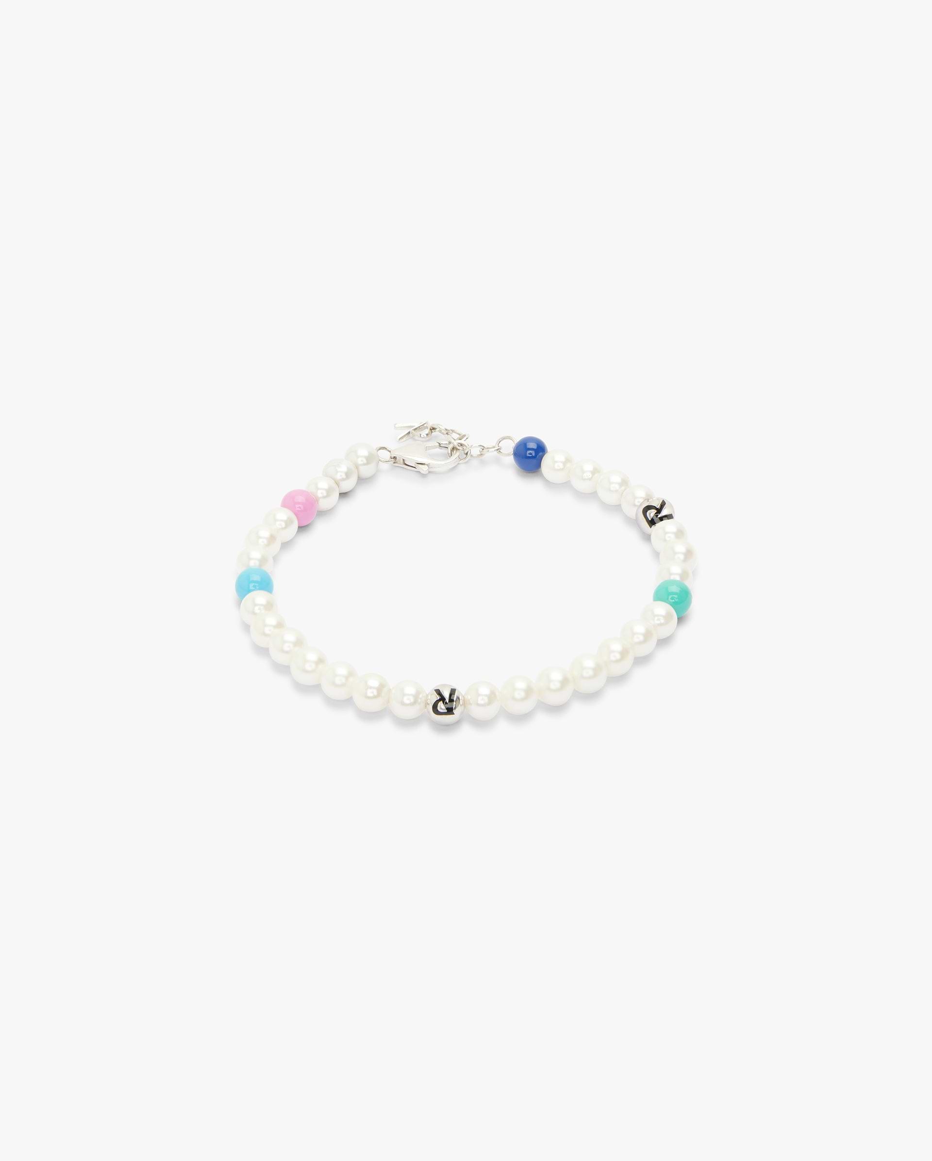 Front product image of a womens pearl bracelet on a plain white background | Pearl Bracelet in Pearl | Elegant pearl bracelet | FW24 Accessories | Represent Clo