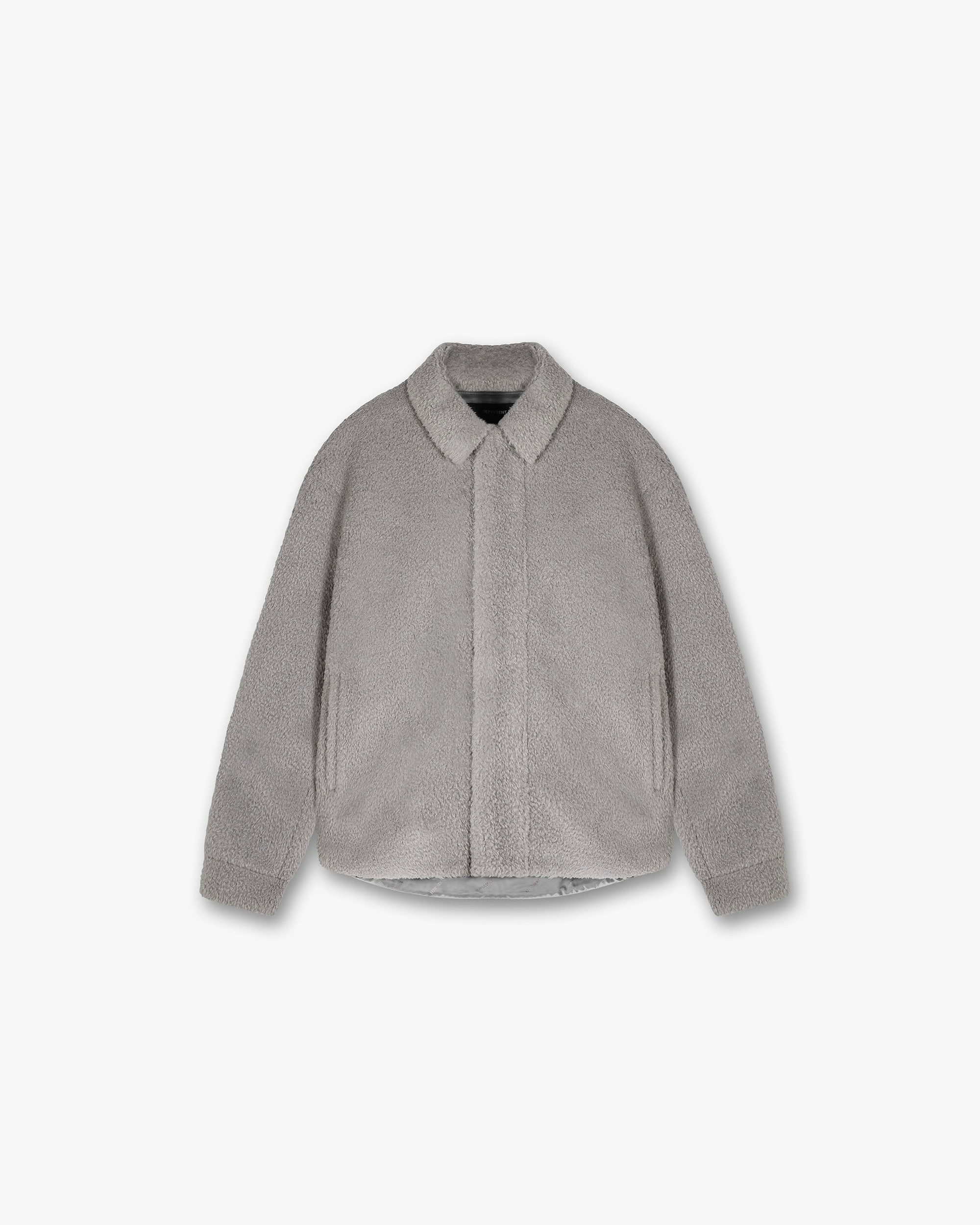 Front product image of a mens grey shirt on a plain white background | Shearling Scoop Hem Shirt in Ice Grey | Shearling shirt with scoop hem design | PRE SS24 Shirts | Represent Clo