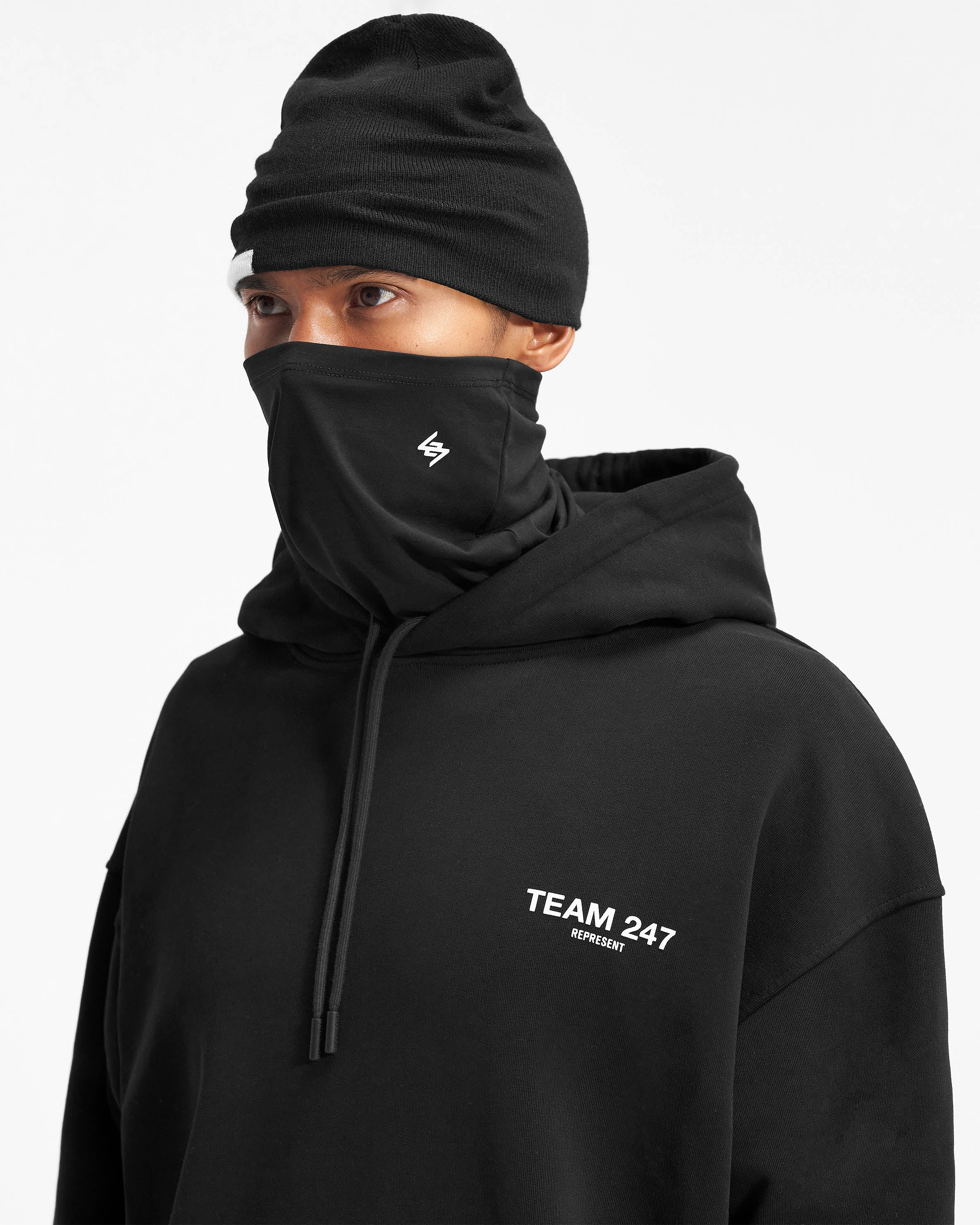 Back product image of a mens black snood on a plain white background | 247 Snood in Black | Neck warmer with high build branding | 247 Accessories | Represent Clo