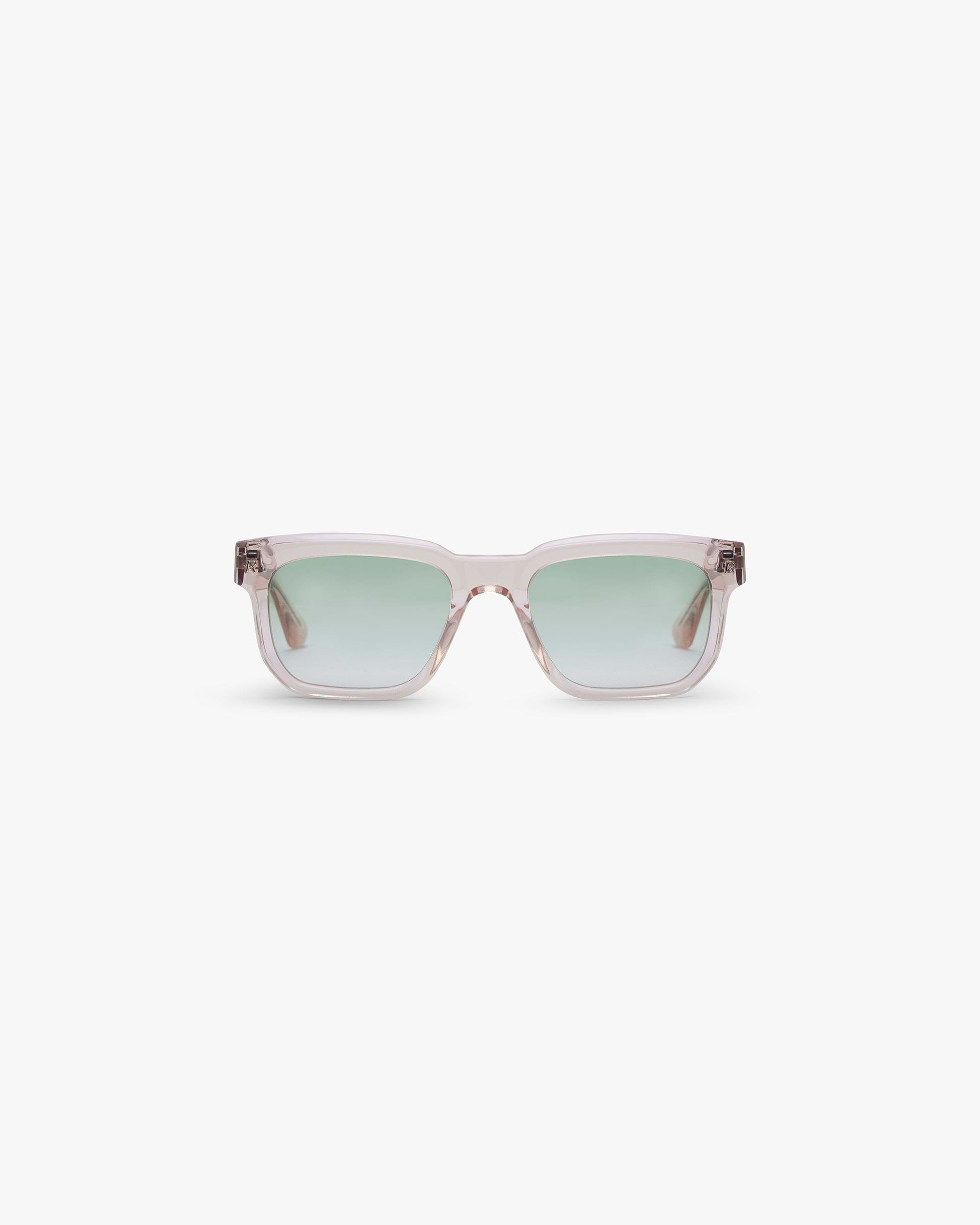 Front product image of mens pink sunglasses on a plain white background | Represent Hamptons Sunglasses in Pink Transparent | Stylish transparent frame sunglasses | SS24 Accessories | Represent Clo