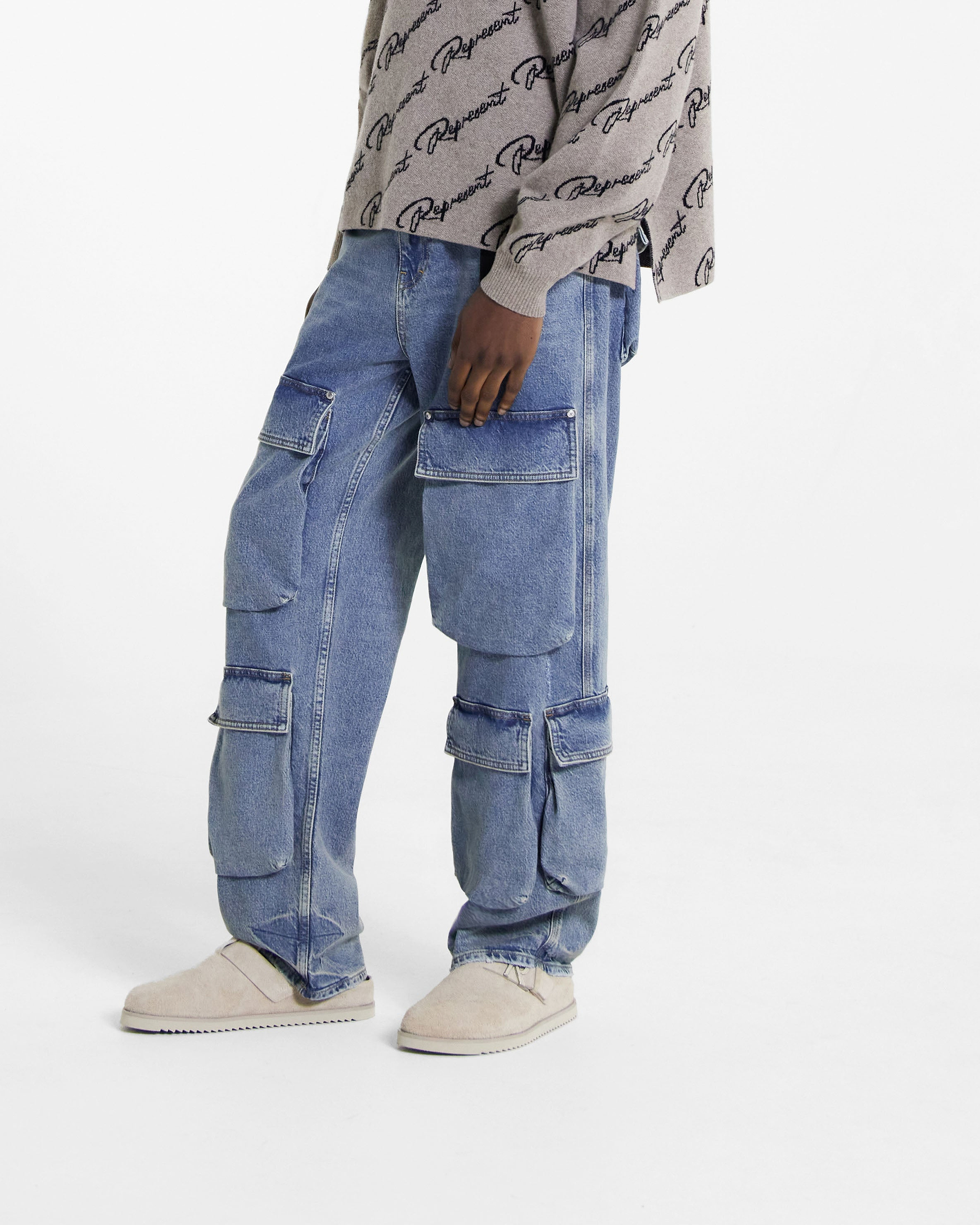 Back product image of mens blue cargo denim on a plain white background | R3Ca Cargo Denim in Blue | Baggy fit denim with cargo pockets | SS24 Denim | Represent Clo