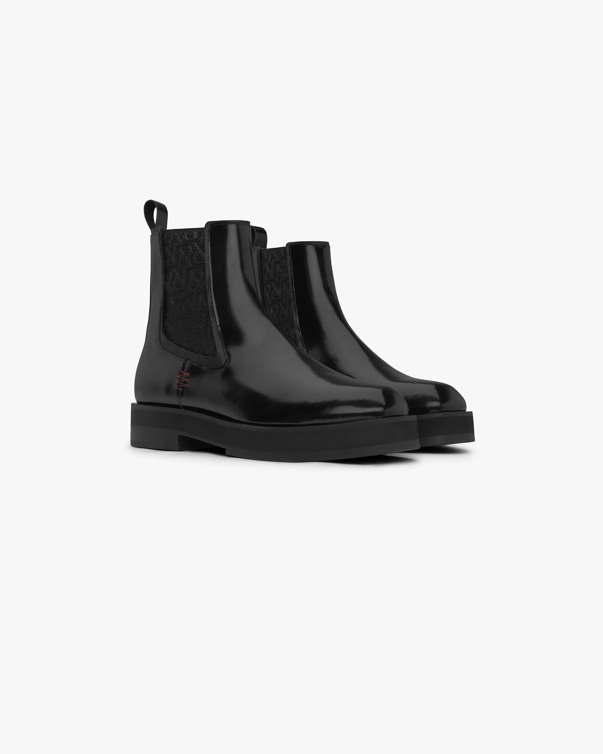 Back product image of a mens black chelsea boot on a plain white background | Chelsea Boot in Black | Square toe boot with zigzag stitching and elastic gusset | FW23 Footwear | Represent Clo