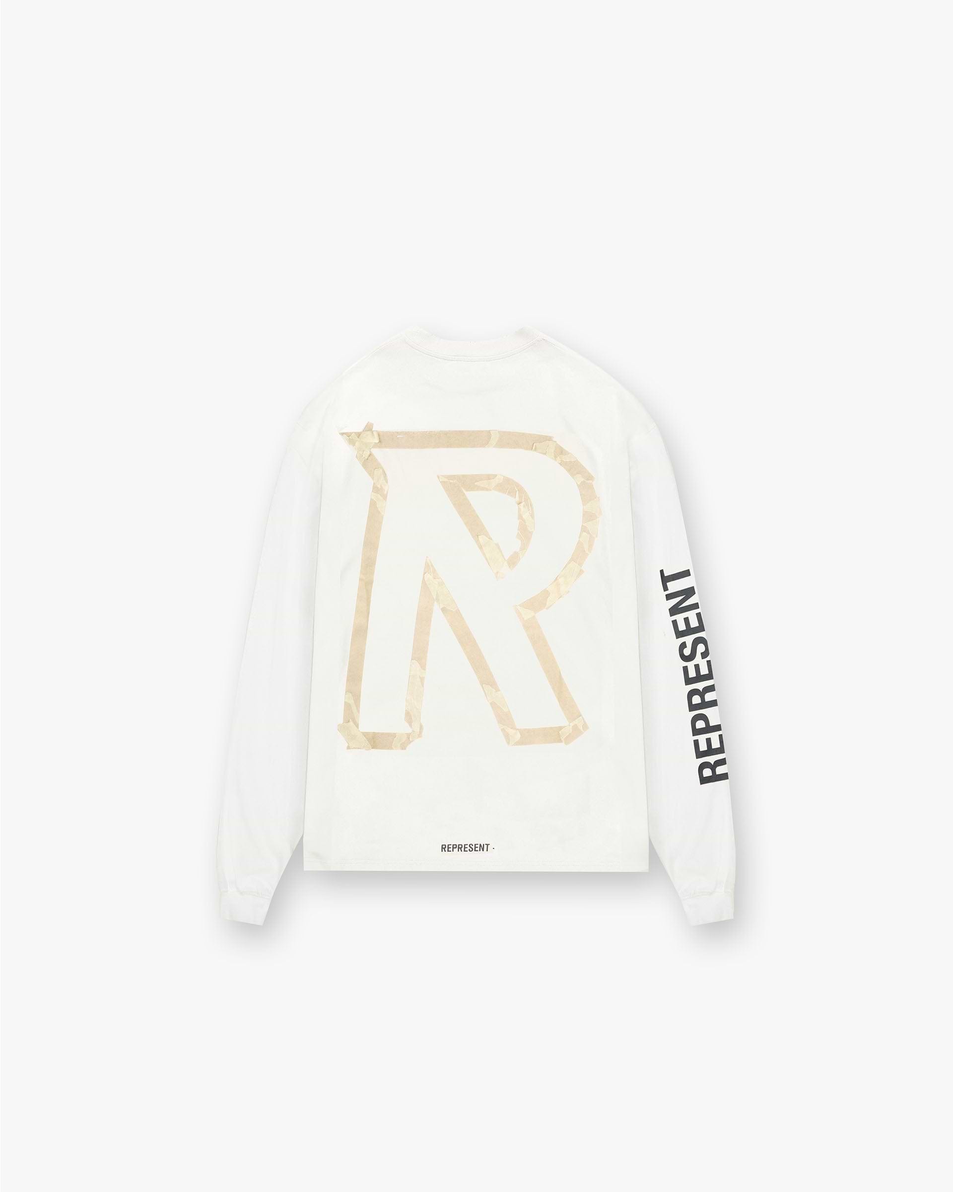 Back product image of a mens white t-shirt on a plain white background | Masking Tape Initial Long Sleeve T-Shirt in Flat White | Oversized long sleeve t-shirt with 3D masking tape effect | FW24 T-Shirts | Represent Clo
