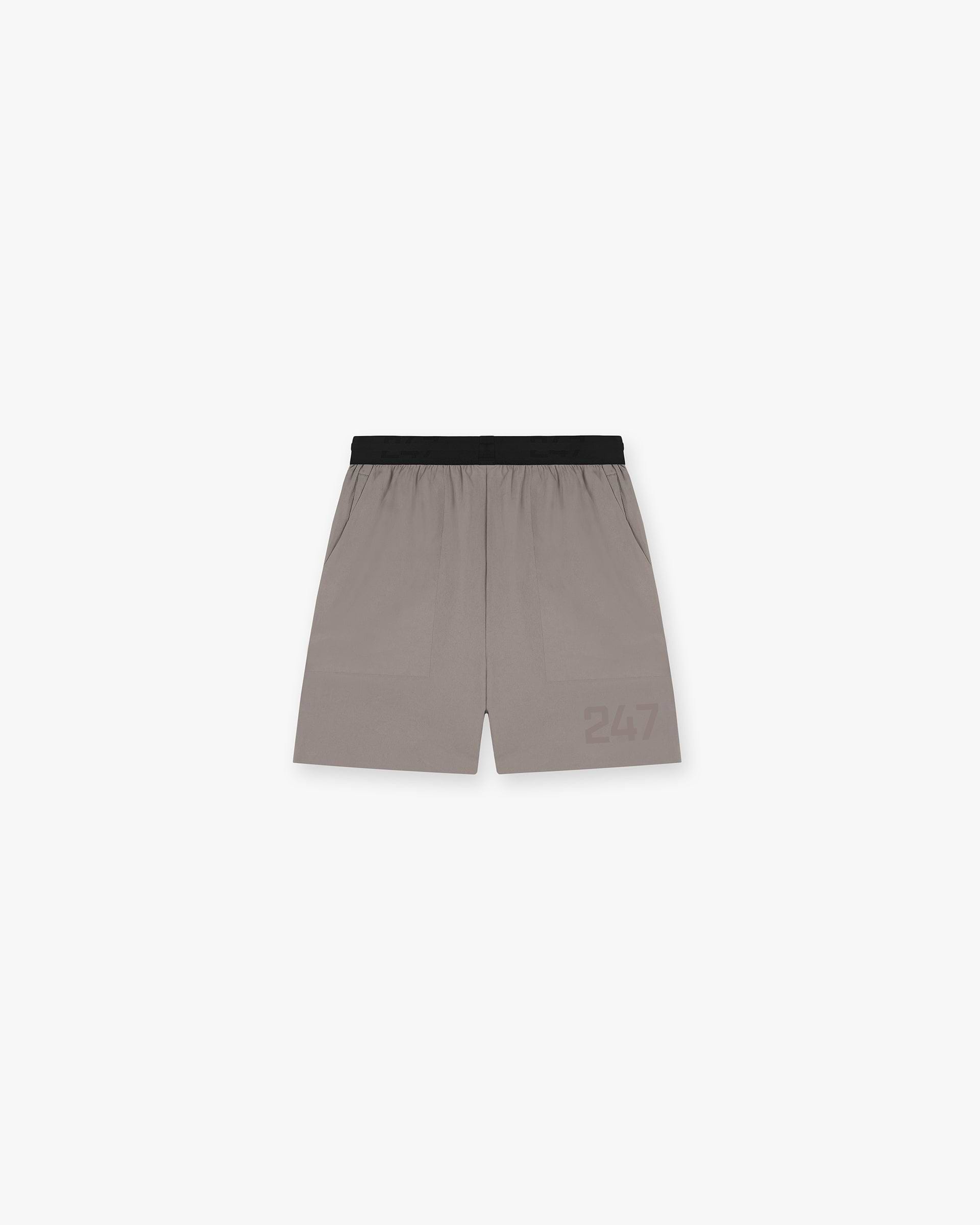 Back product image of mens grey gym shorts on a plain white background | 247 Fused Shorts in Cinder | Gym shorts with reverse coil zippers and fused side entry pocket | 247 Shorts | Represent Clo