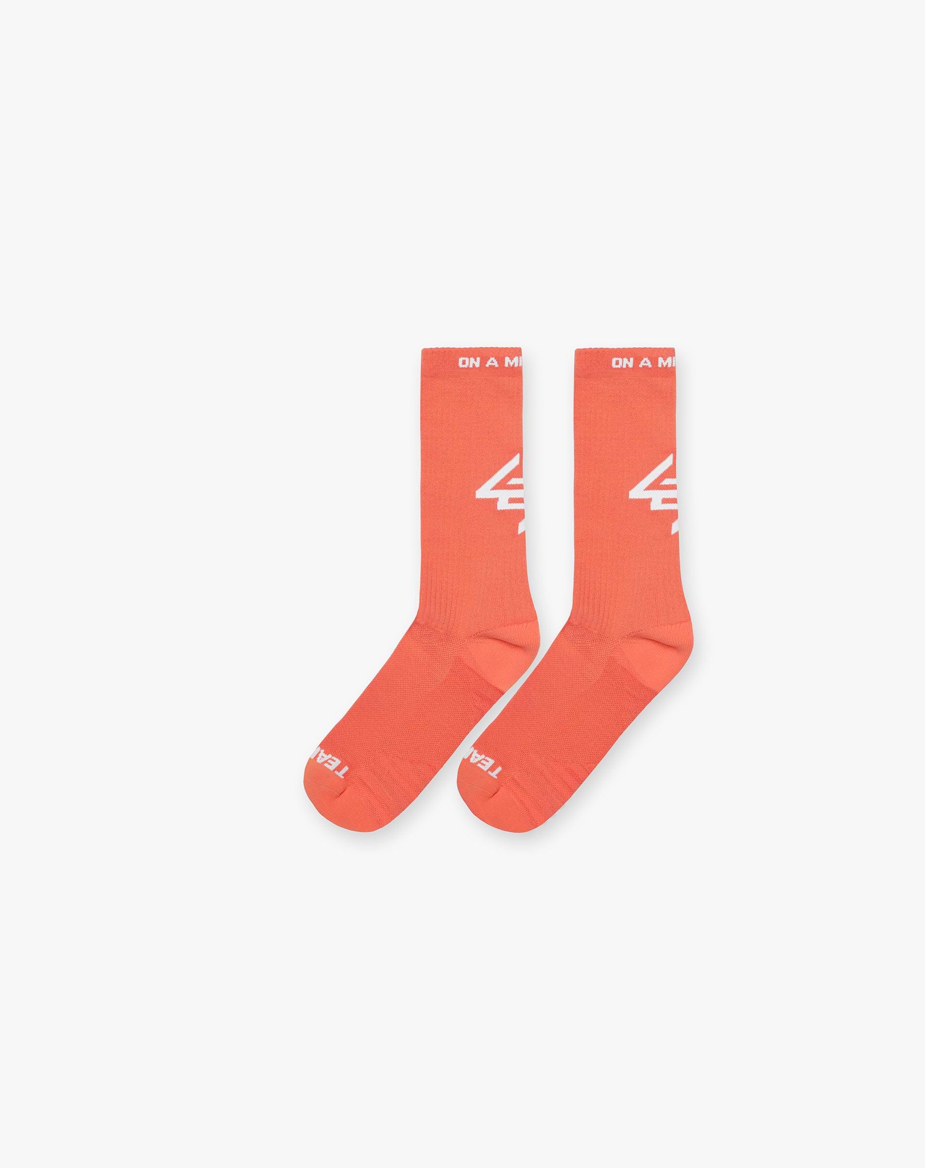 Back product image of mens coral socks on a plain white background | 247 Logo Socks in Coral | Training socks with super soft feel | 247 Accessories | Represent Clo