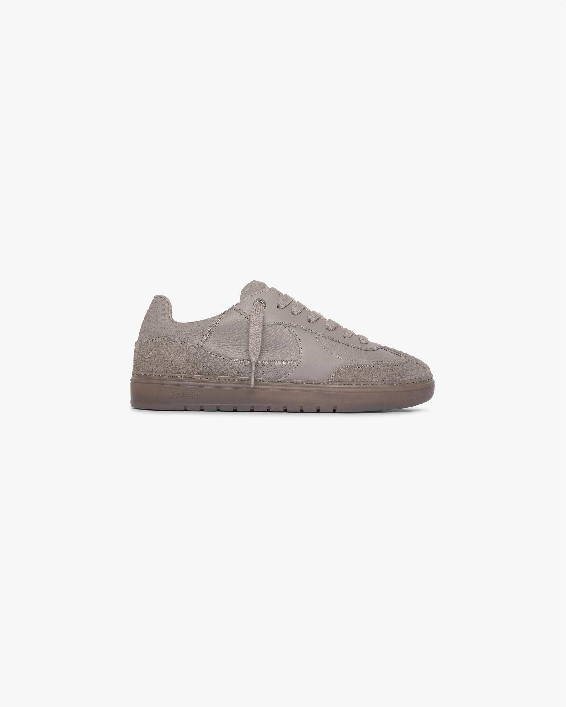 Front product image of a mens washed taupe item on a plain white background | Virtus in Washed Taupe | Oversized slub t-shirt with tonal embroidery and distressed details | SS24 Other | Represent Clo