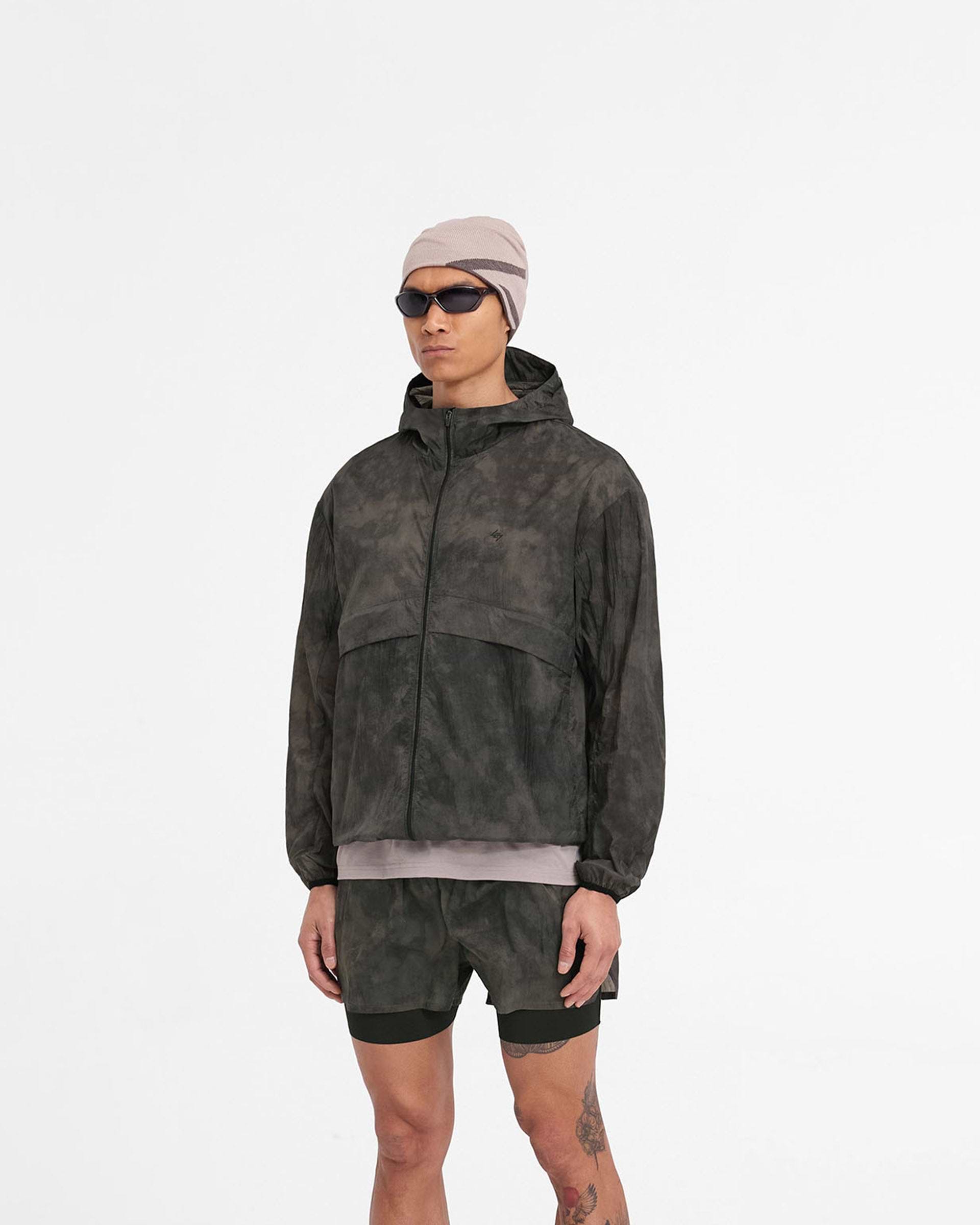 Back product image of a mens green jacket on a plain white background | 247 Hooded Training Jacket in Terrain | Nylon outerwear with DWR coating and storm flaps | 247 Outerwear | Represent Clo