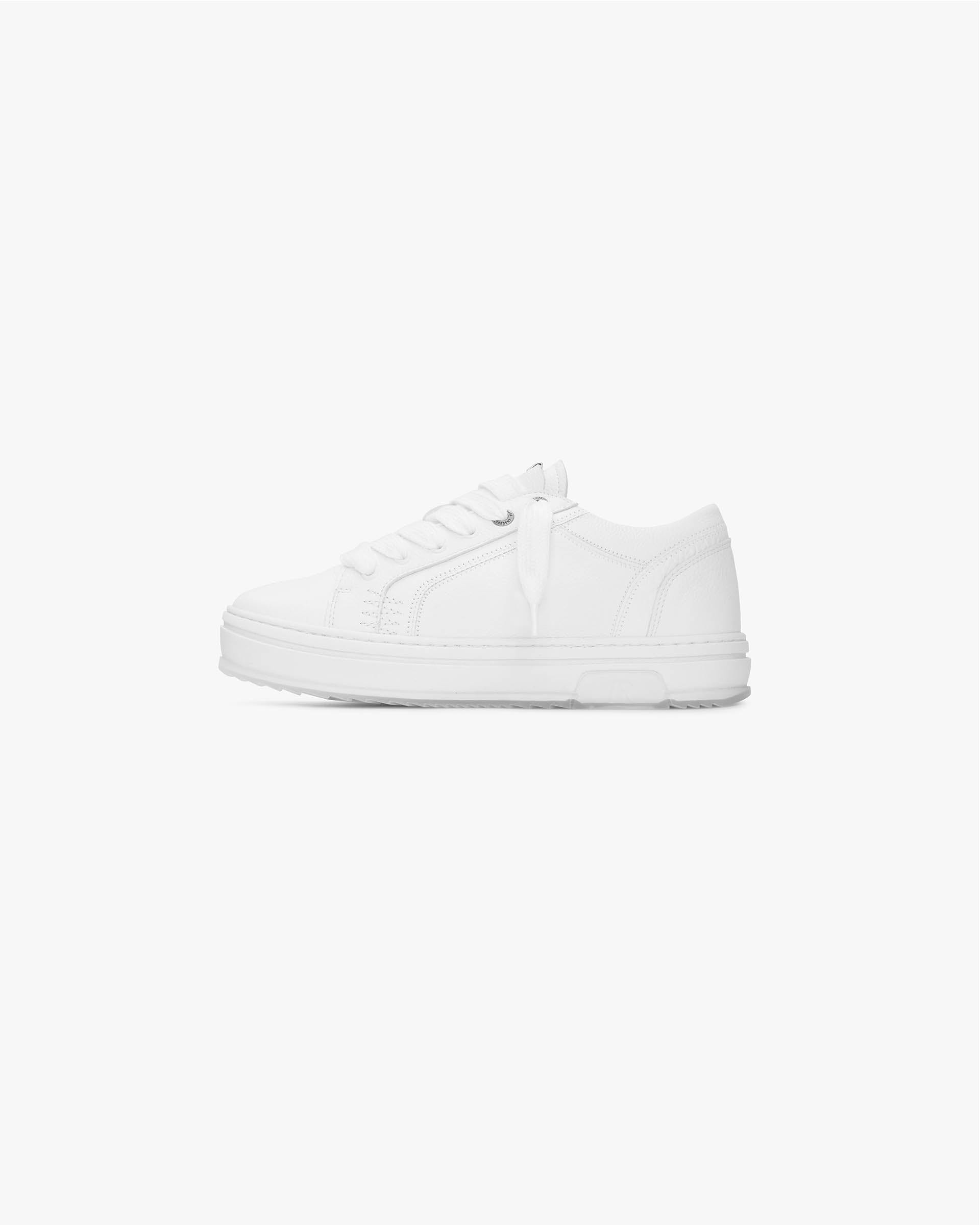 Close-up of a men's white sneaker with chunky lacing on a plain white background | HTN Low Tumbled Leather in Flat White | Low top sneakers with tumbled leather upper and branded metal eyelets | SS24 Footwear | Represent Clo