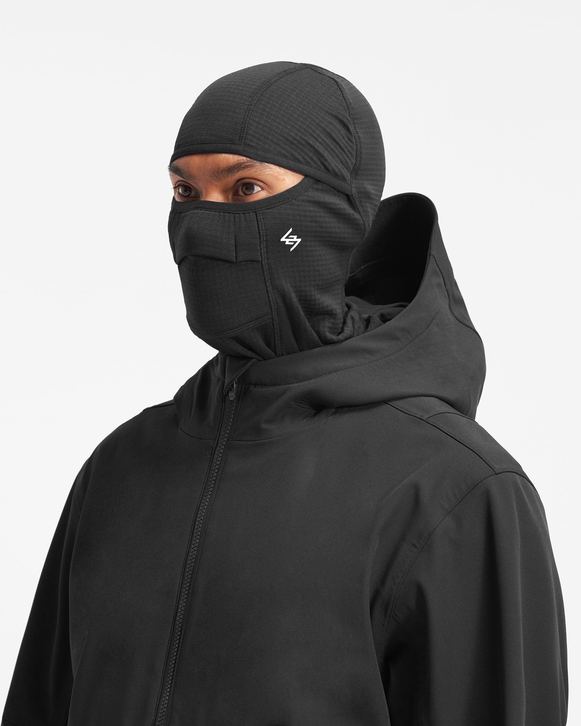 Back product image of a mens black jacket on a plain white background | Team 247 Mission Jacket in Black | Water resistant jacket with taped seams and gridded lining | 247 Outerwear | Represent Clo
