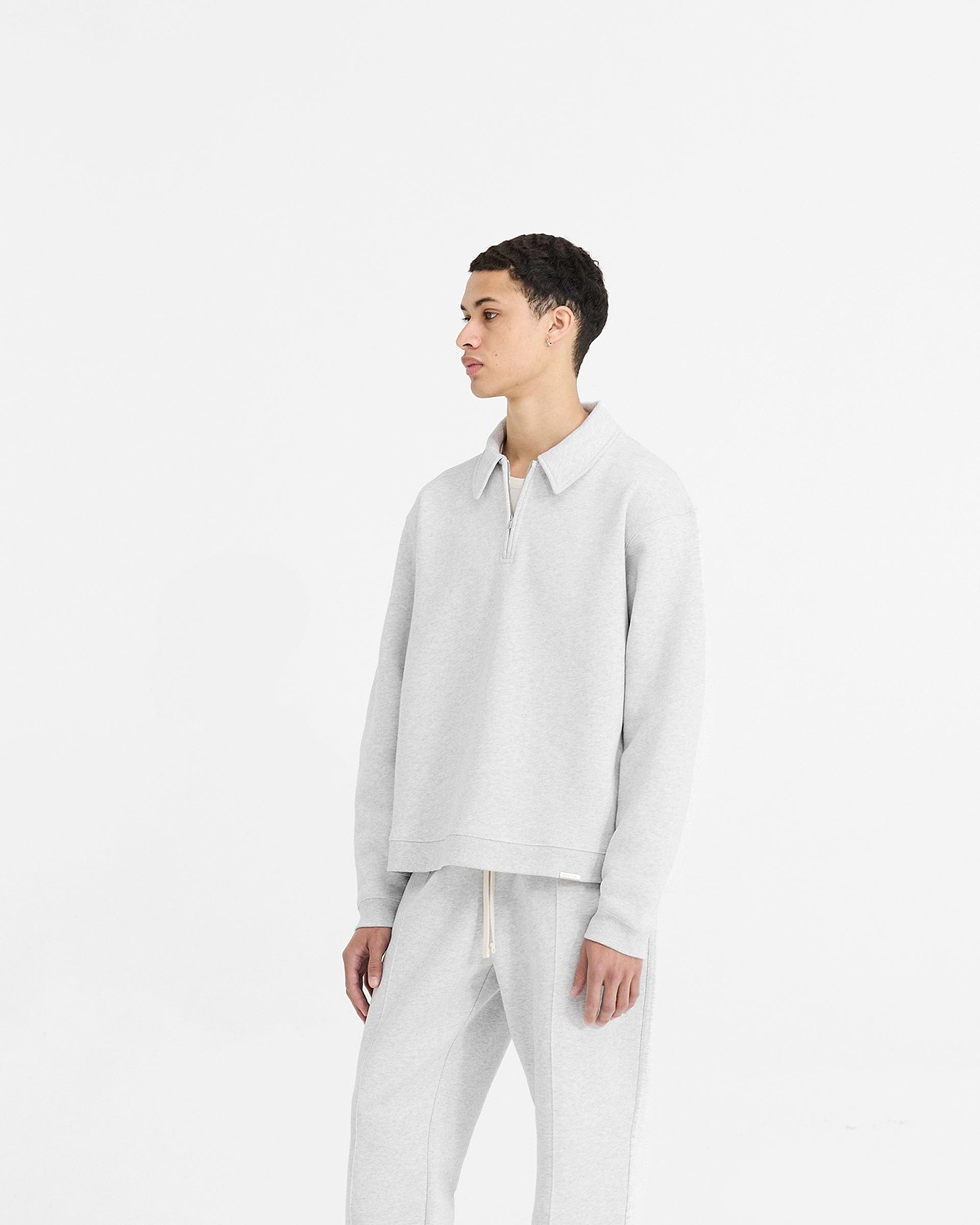 Back product image of a mens grey sweater on a plain white background | Initial Boxy Quarter Zip in Ice Grey Marl | Sweater with super cropped body and RiRi zip | Initial Sweaters | Represent Clo