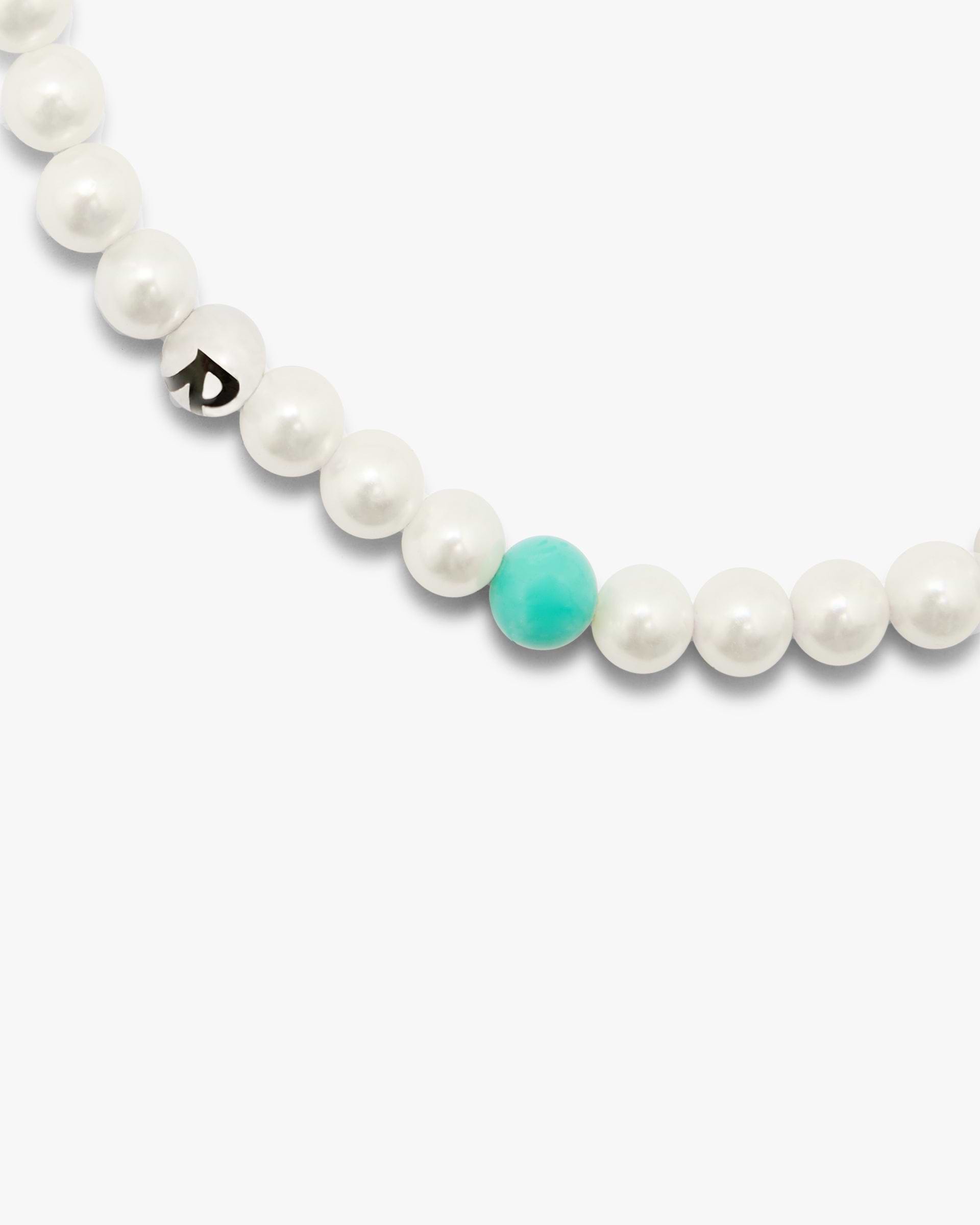 Back product image of a mens white pearl bracelet on a plain white background | Pearl Bracelet in Pearl | Bracelet with natural pearls and coloured beads | FW24 Accessories | Represent Clo