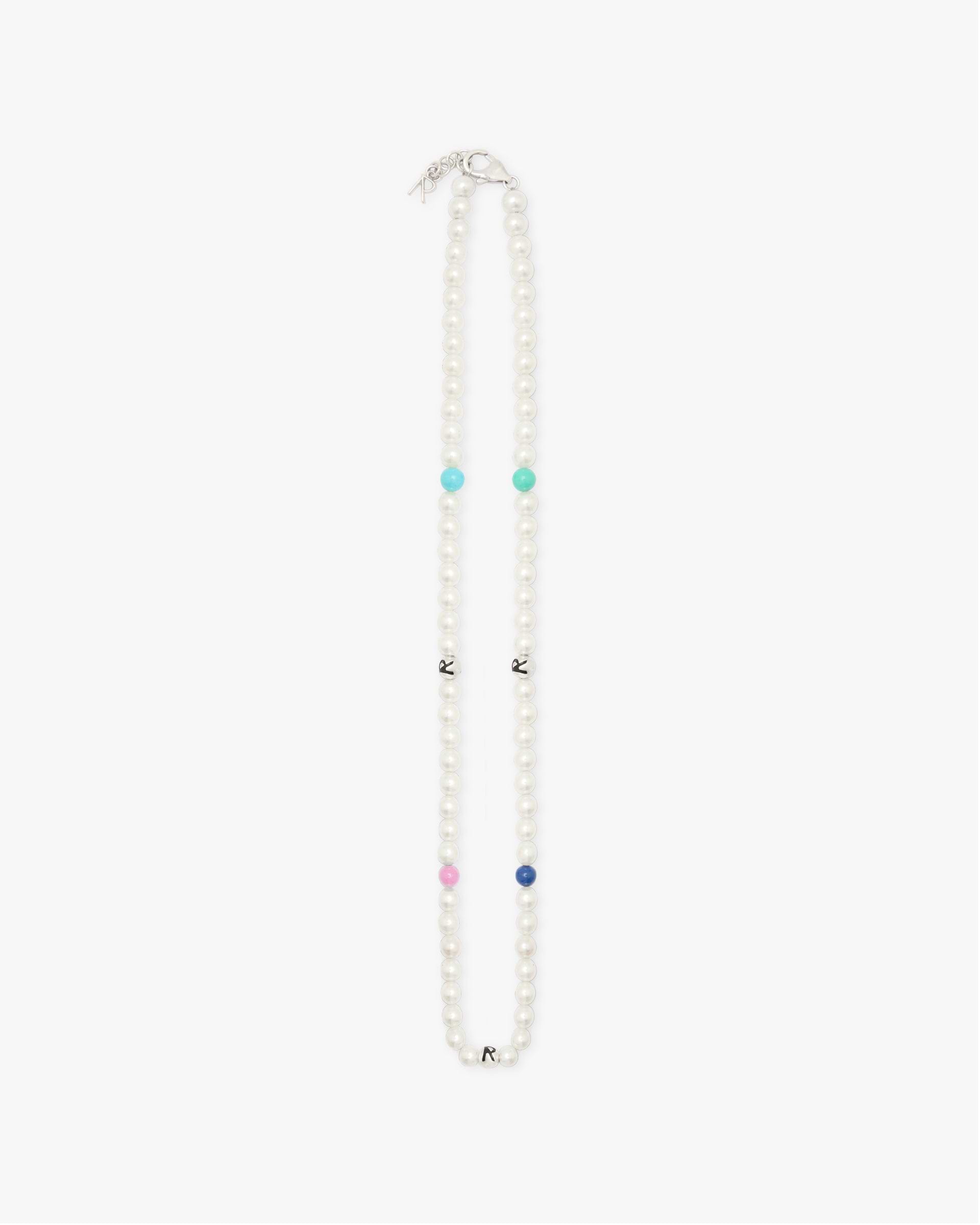 Front product image of a womens white pearl necklace on a plain white background | Pearl Necklace in Pearl | Pearl necklace with classic design | FW24 Accessories | Represent Clo
