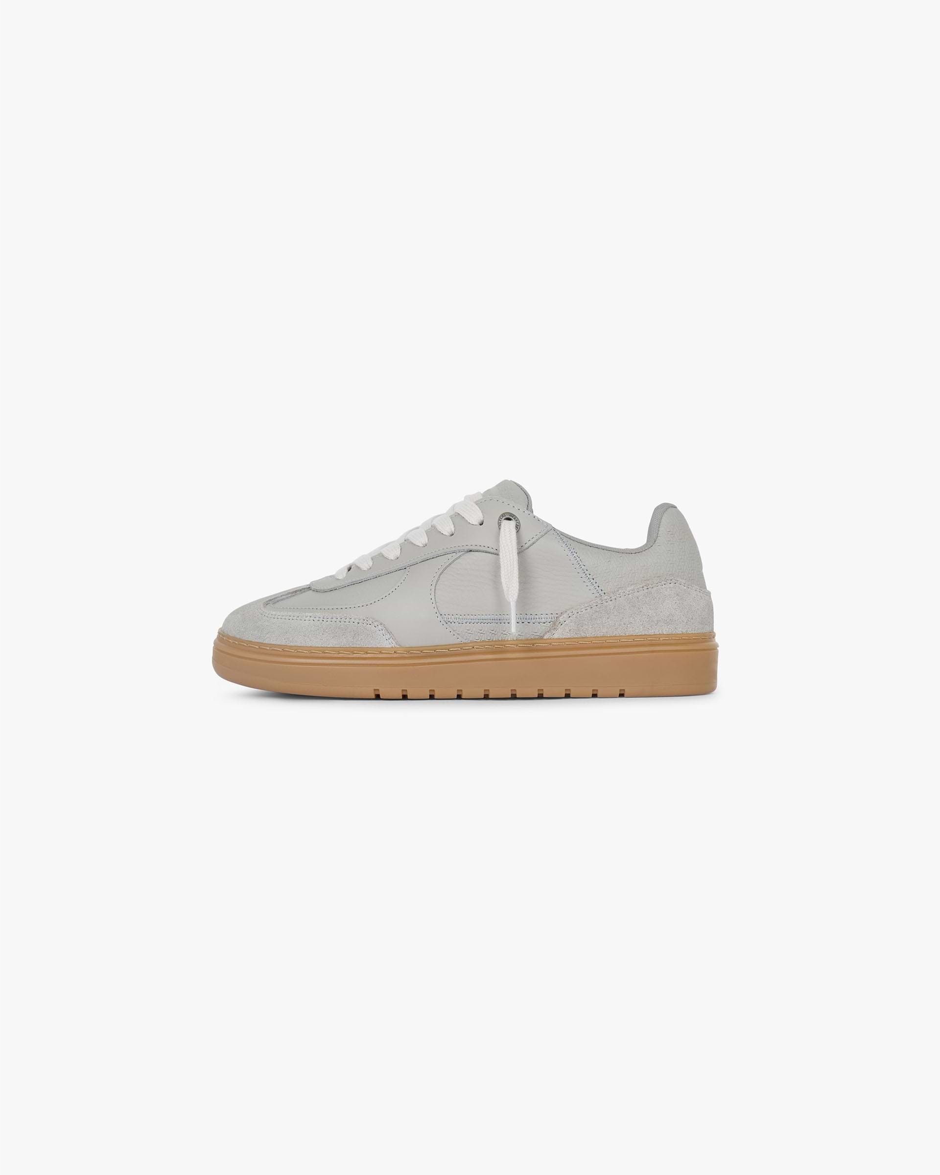 Back product image of a mens grey sneaker on a plain white background | Virtus in Dark Grey | Low profile sneaker with leather and suede mix | FW24 Footwear | Represent Clo