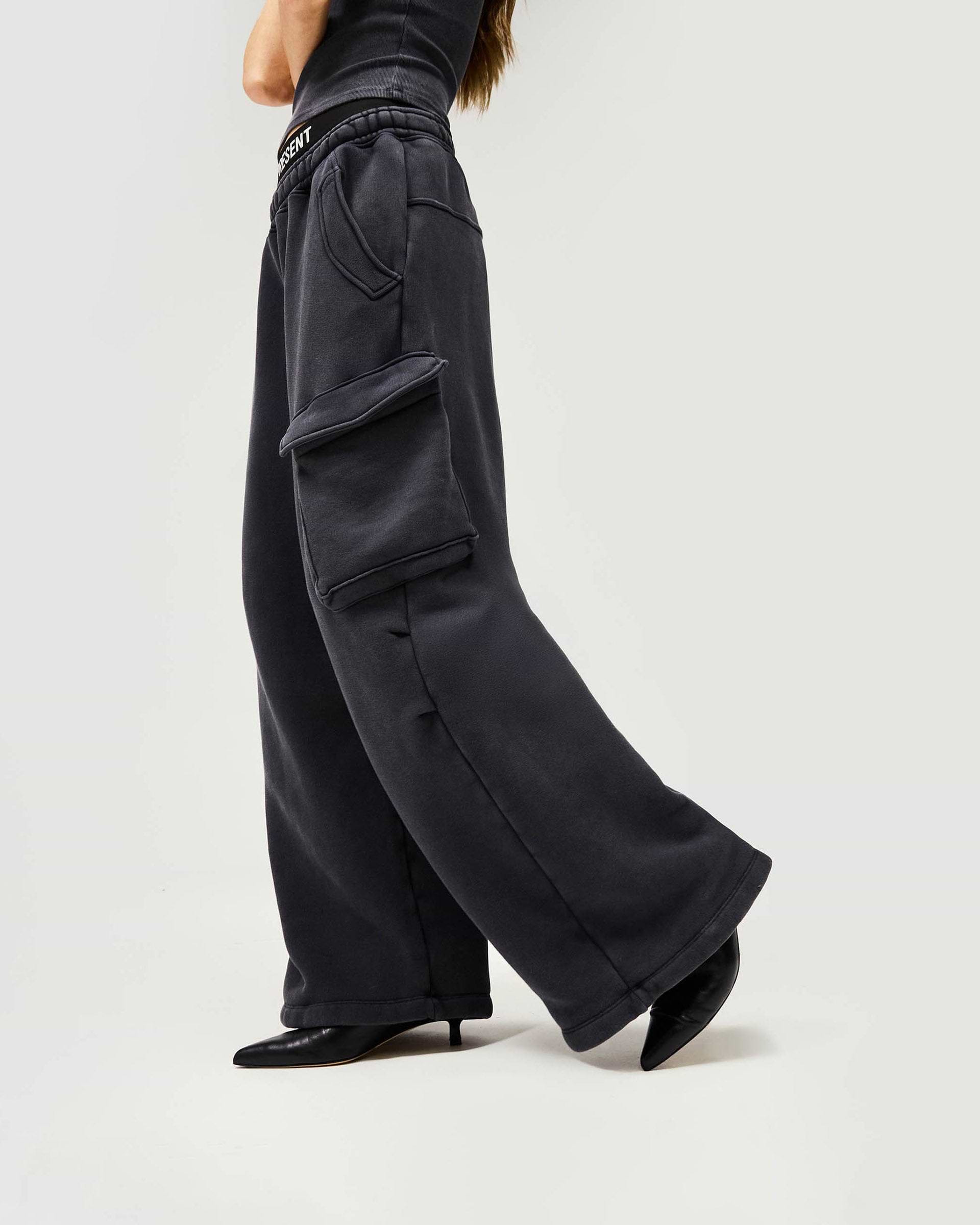 Back product image of a womens black jogger on a plain white background | Initial Cargo Jogger in Washed Black | Sweat trousers with patch pockets | Womens Initial Bottoms | Represent Clo