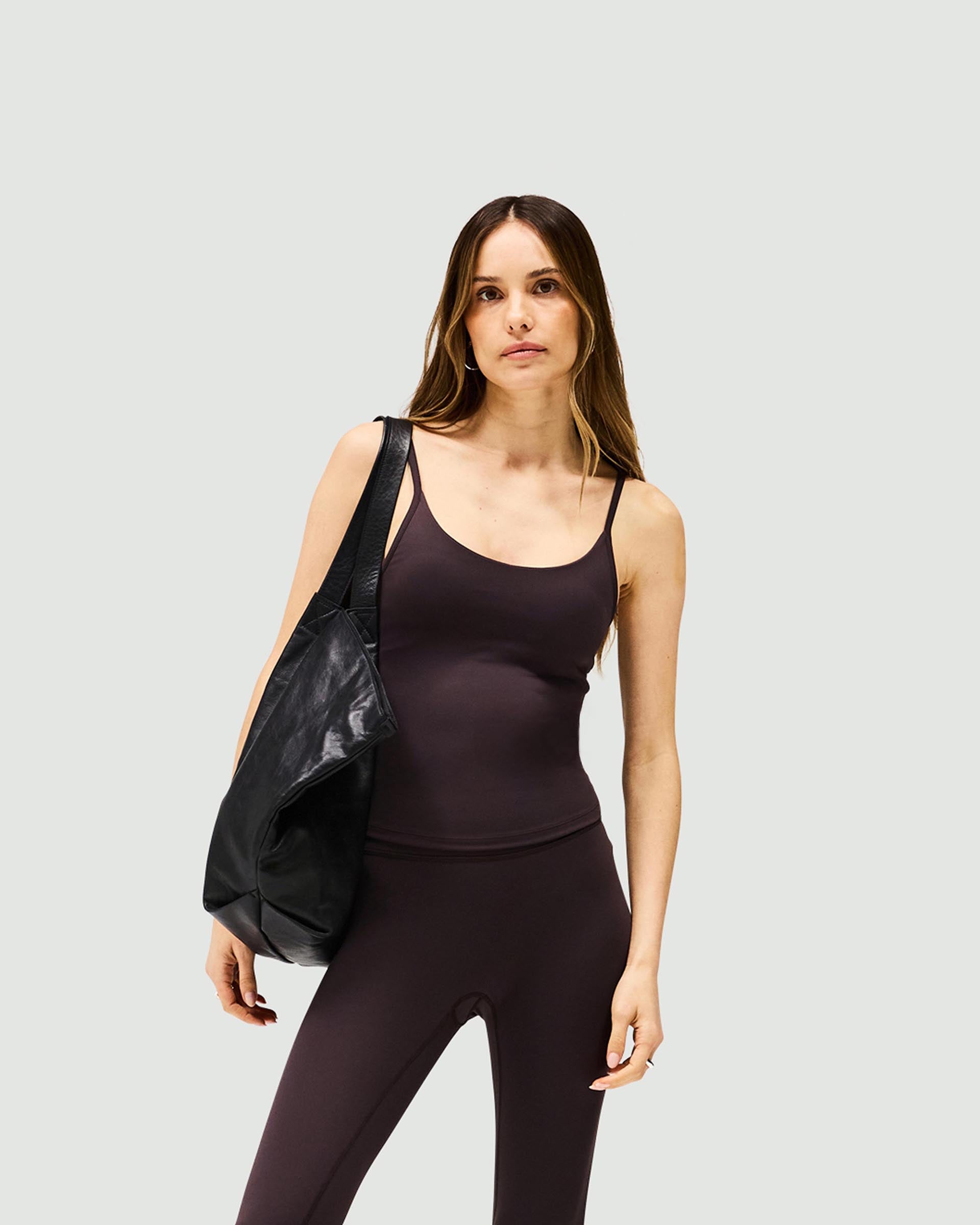Back product image of a womens black cami top on a plain white background | Owners Club Cami Top in Black Coffee | Cami top with built-in bra and scoop back | Womens Owners Club Tops | Represent Clo