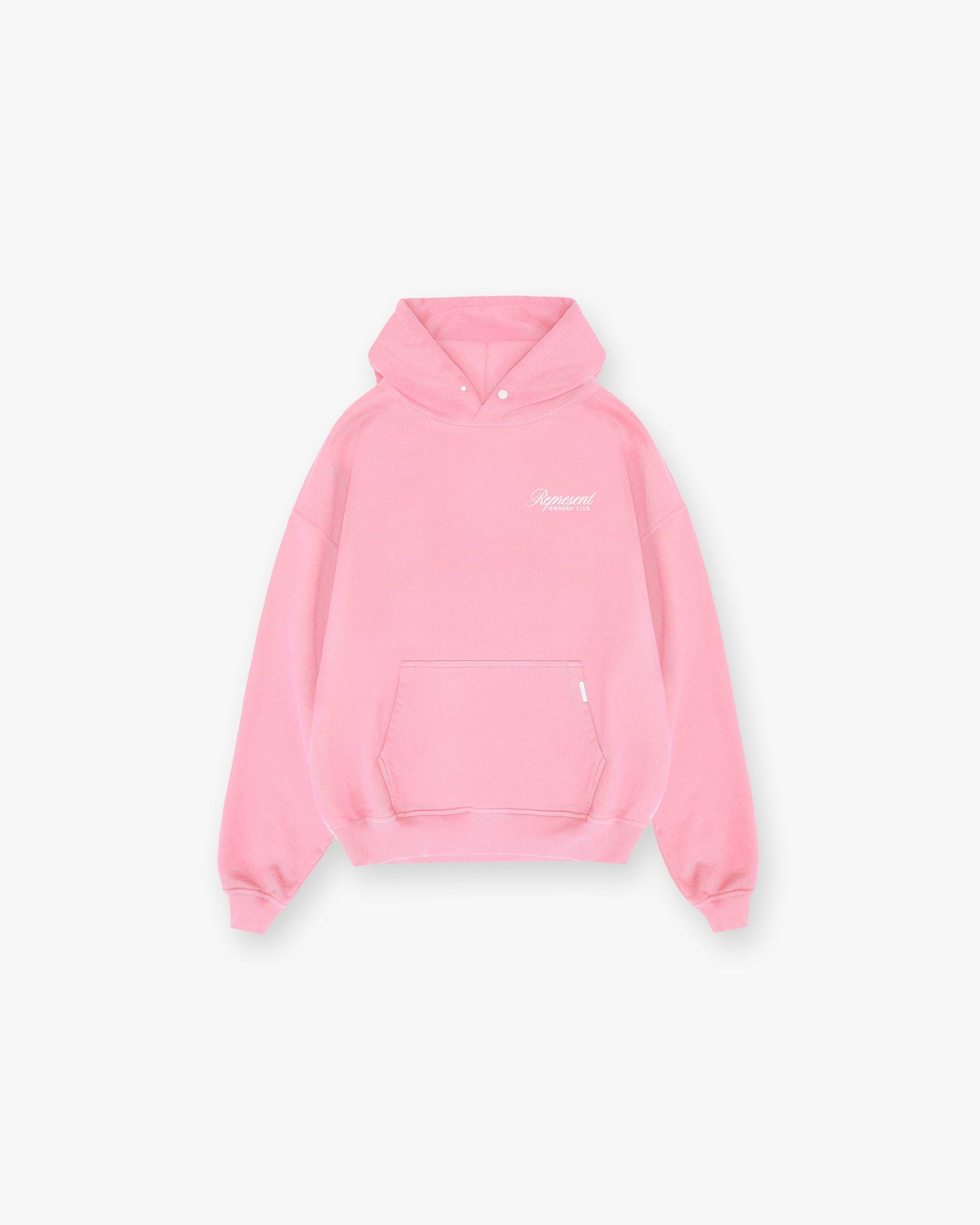 Back product image of a mens pink hoodie on a plain white background | Represent Owners Club Script Hoodie in Pink | Hoodie with ribbed trims and script graphic print | Owners Club Hoodies | Represent Clo