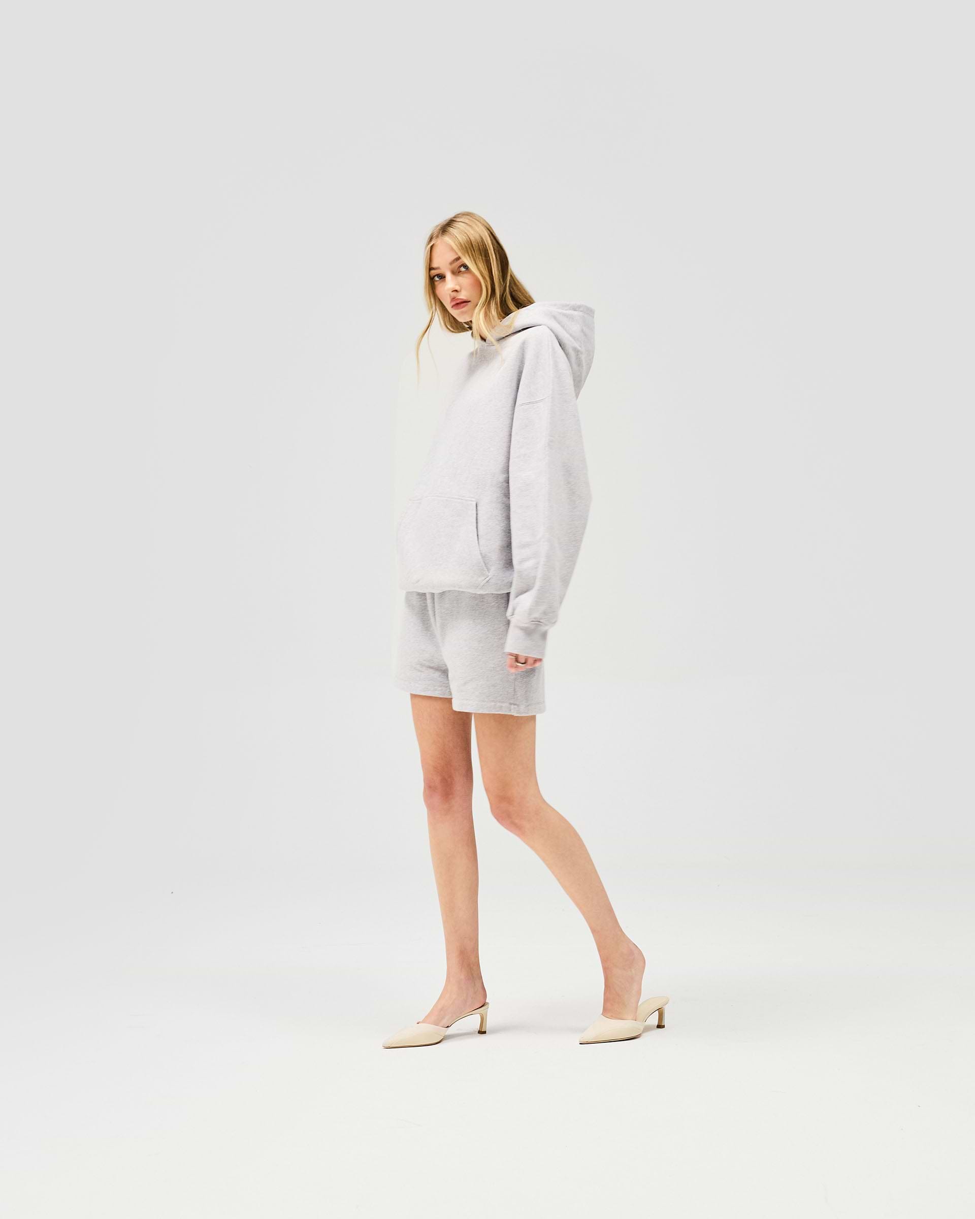 Back product image of a womens grey shorts on a plain white background | Owners Club Short in Grey Marl | Sweat shorts with elasticised leg hem cuffs | Womens Owners Club Shorts | Represent Clo