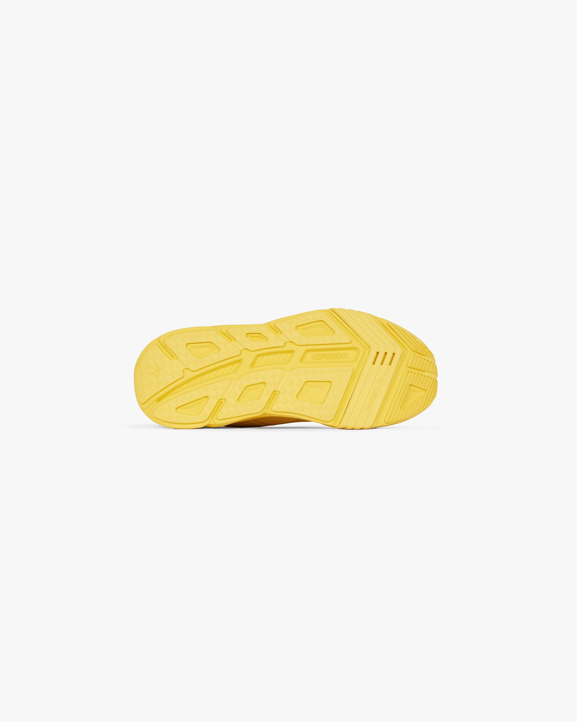 Back product image of mens yellow running shoe on a plain white background | 247 Arc-1 Runner in Yellow | Performance engineered running shoe with lightweight mesh upper | 247 Footwear | Represent Clo
