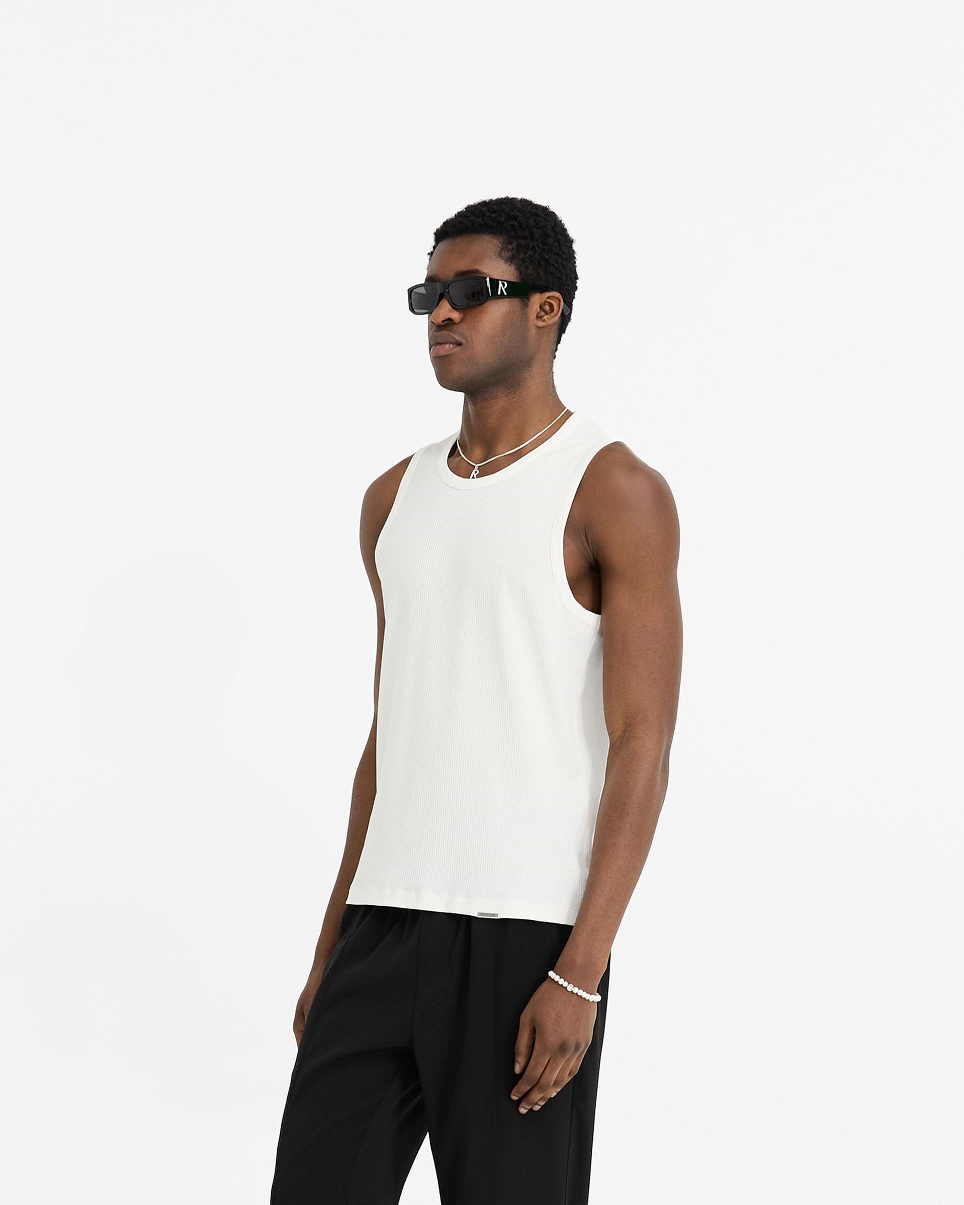 Back product image of a mens white vest on a plain white background | Initial Rib Vest in Flat White | Rib vest with neck and armhole binding details | Initial T-Shirts | Represent Clo