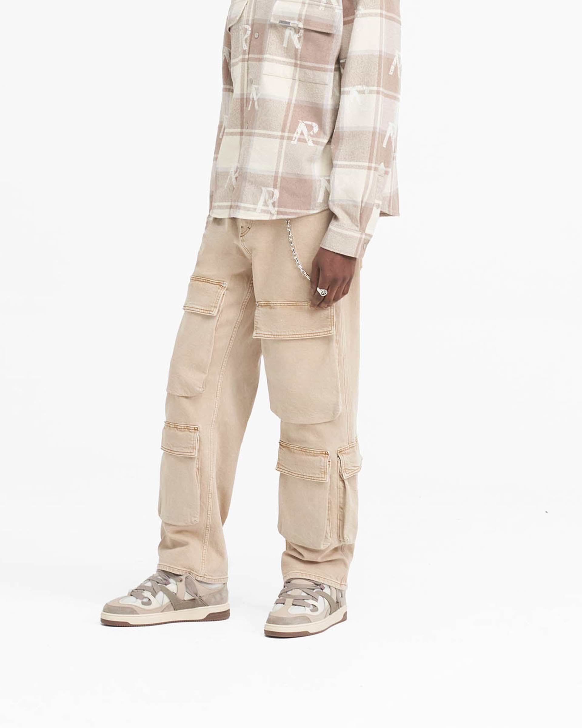 Back product image of mens dirt cashmere denim on a plain white background | R3Ca Cargo Denim in Dirt Cashmere | Denim with baggy fit and multiple pockets | SS24 Denim | Represent Clo