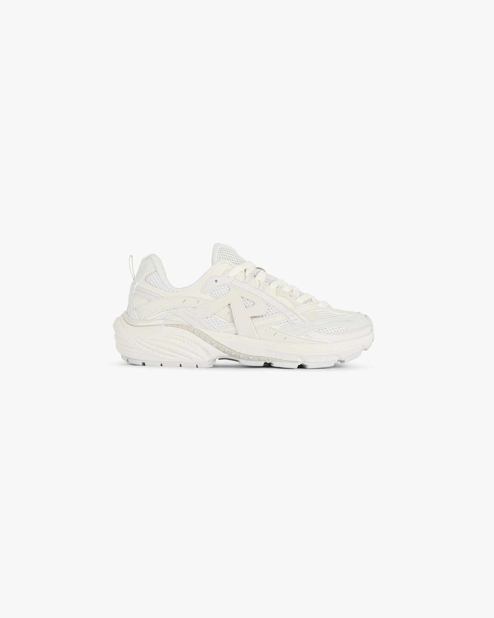 Front product image of mens off white shoe on a plain white background | Storm Runner in Off White | Sleek footwear design with Represent branding | FW24 Footwear | Represent Clo