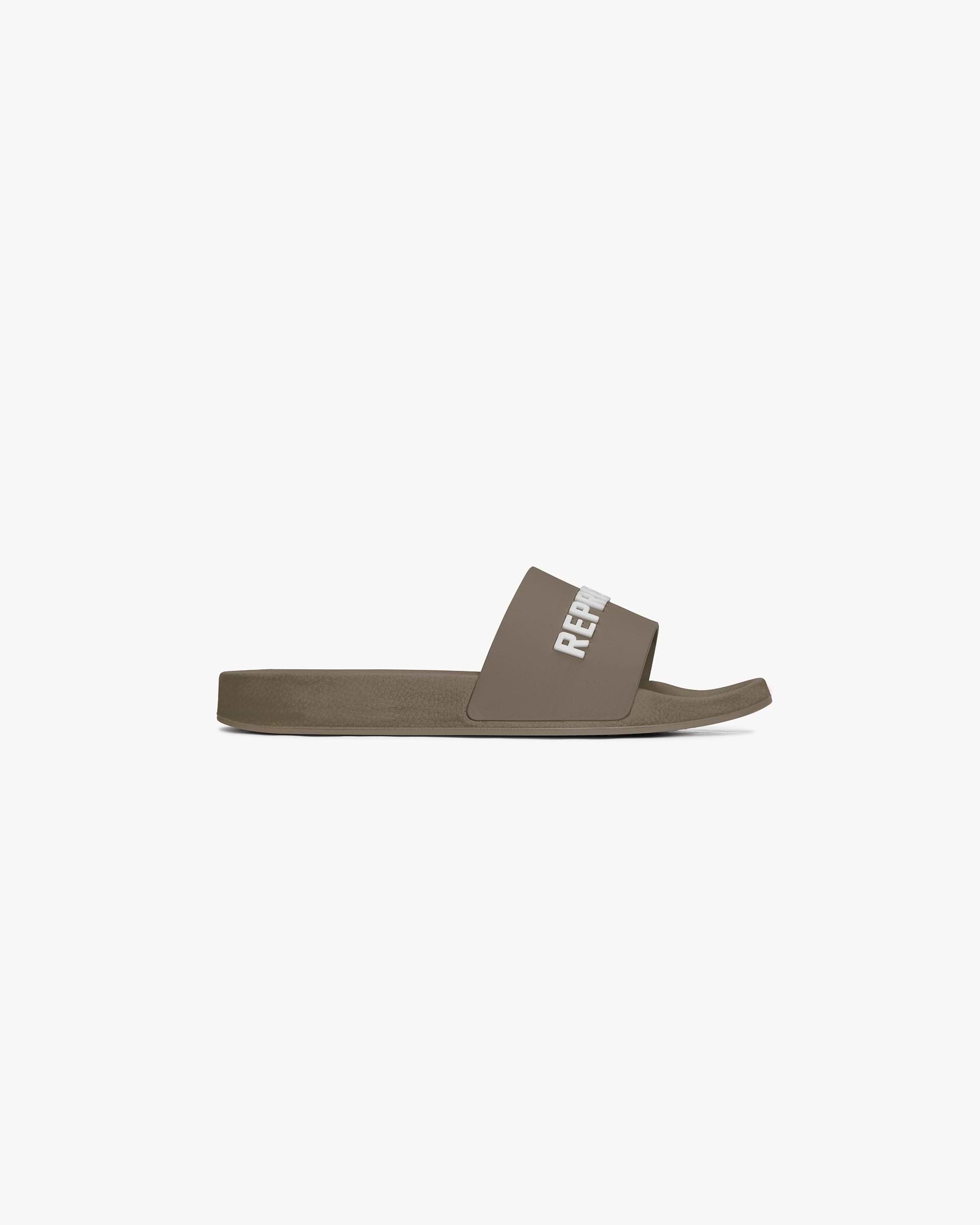 Front product image of mens cashmere slide on a plain white background | Represent Pool Slide in Cashmere | Textured slides with rubber sole | FW24 Footwear | Represent Clo