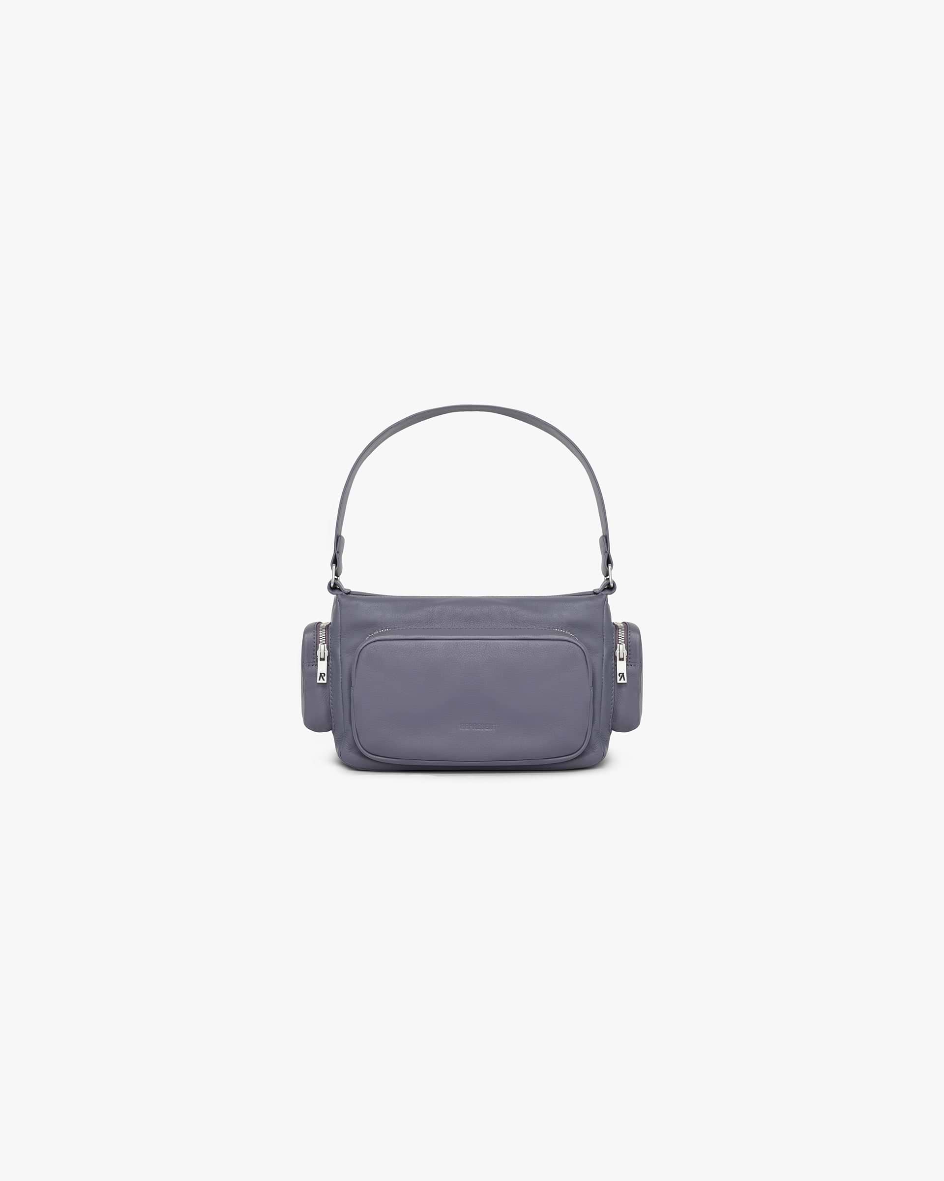 Front product image of a womens grey shoulder bag on a plain white background | Utility Shoulder Bag in Excalibur | Utility shoulder bag with multiple compartments | Womens SS25 Accessories | Represent Clo