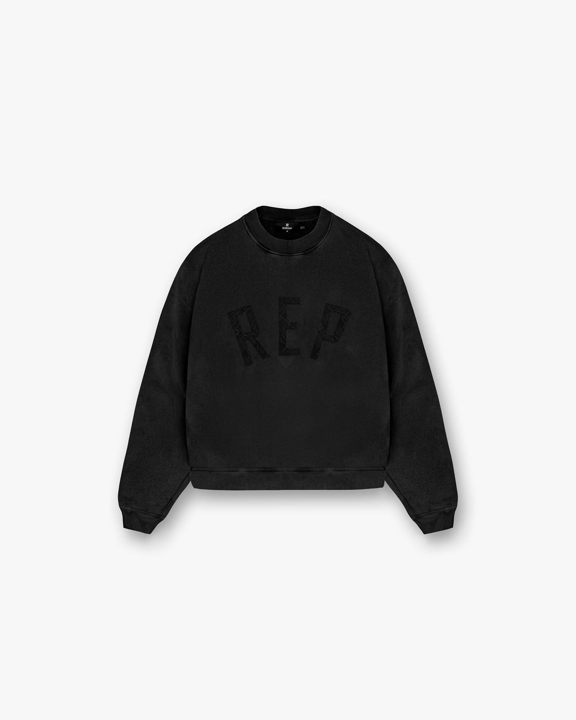 Front product image of a mens black sweater on a plain white background | Rep Applique Sweater in Off Black | Heavyweight loopback fleece sweater | SS25 Sweaters | Represent Clo