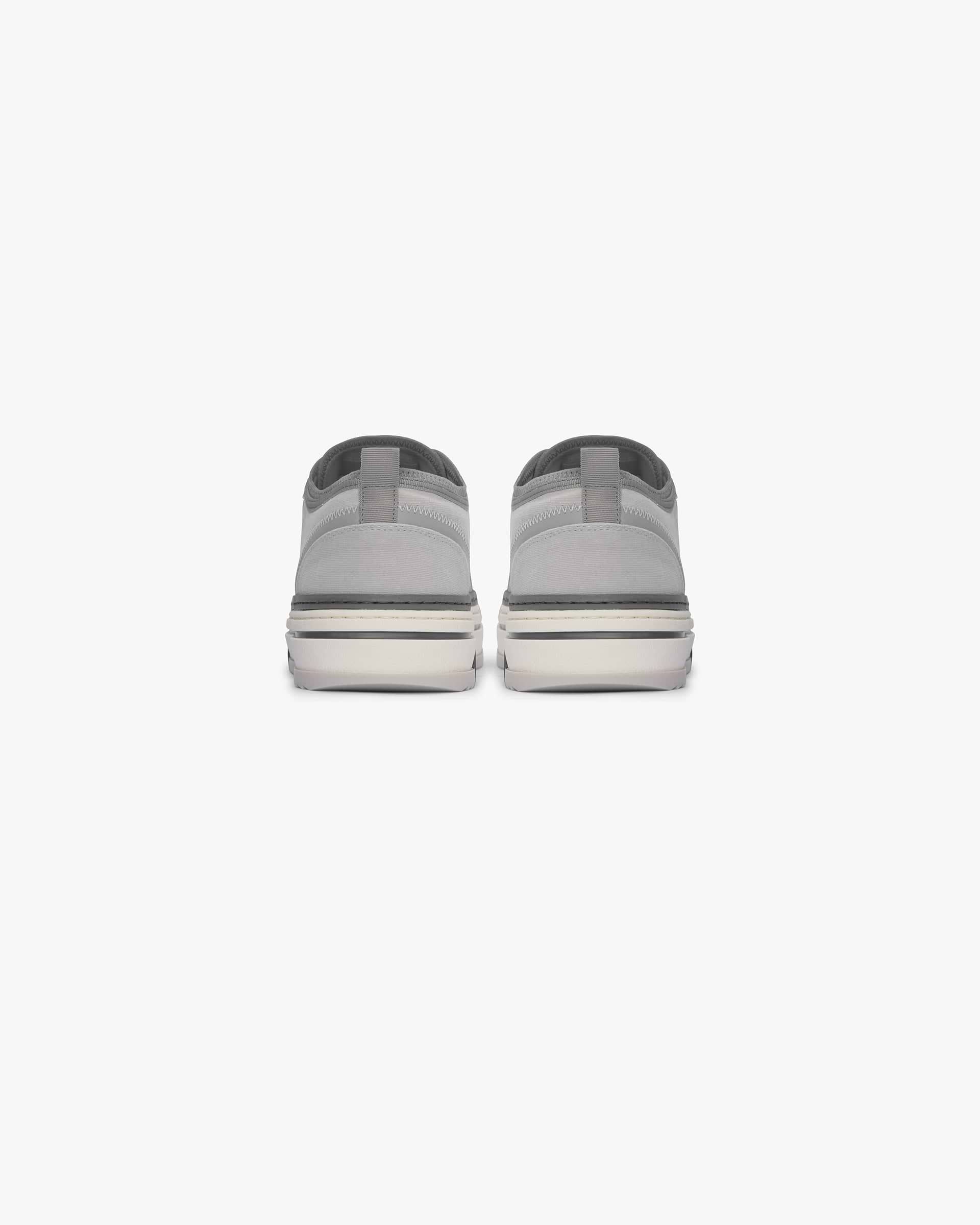 Low top mens grey sneaker on a plain white background | HTN X Low in Warm Grey | Canvas sneakers with chunky rubber outsole | SS24 Footwear | Represent Clo