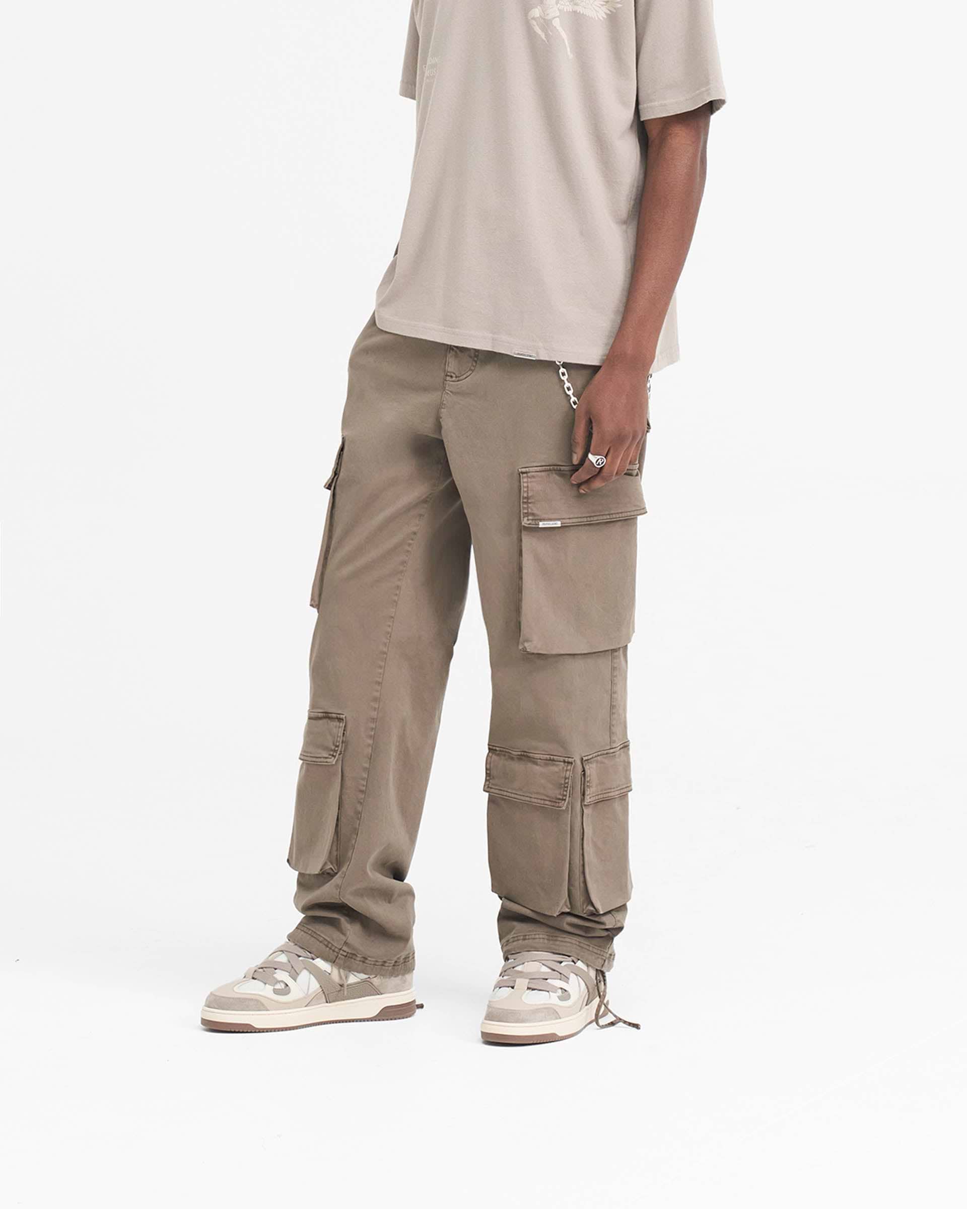 Back product image of mens dawn coloured cargo pants on a plain white background | Baggy Cargo Pant in Dawn | Cargo pants with baggy fit and 3D pockets | SS24 Pants | Represent Clo