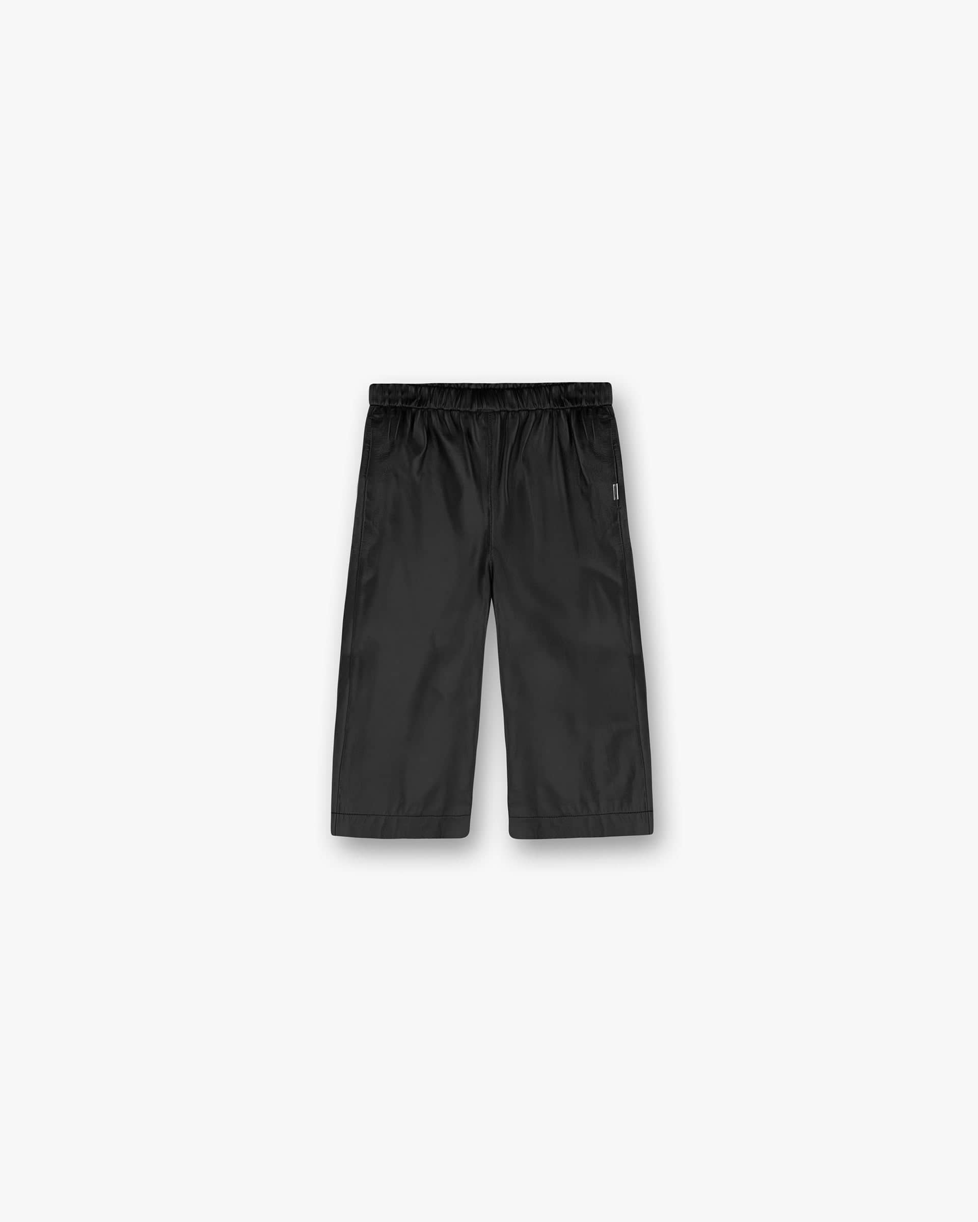 Front product image of a womens black shorts on a plain white background | Fuel Shorts in Jet Black | Shorts with branded waistband and reverse coil zippers | Womens SS25 Shorts | Represent Clo