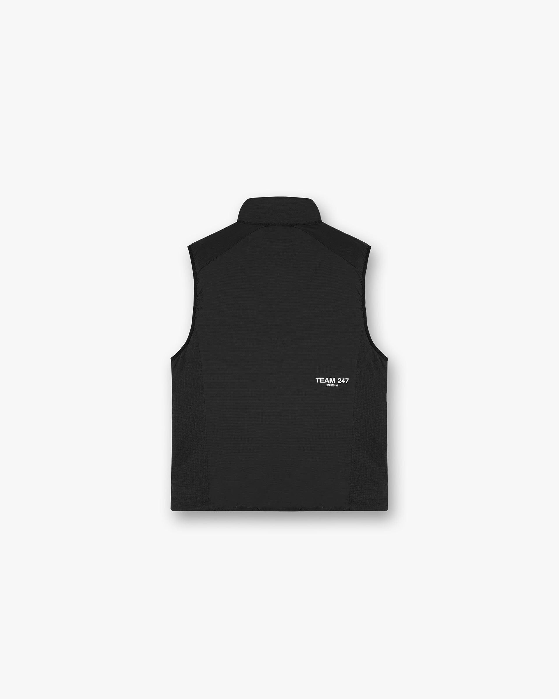 Back product image of a mens black insulated gilet on a plain white background | Team 247 Insulated Gilet in Black | Water repellent gilet with fleece panelling | 247 Outerwear | Represent Clo