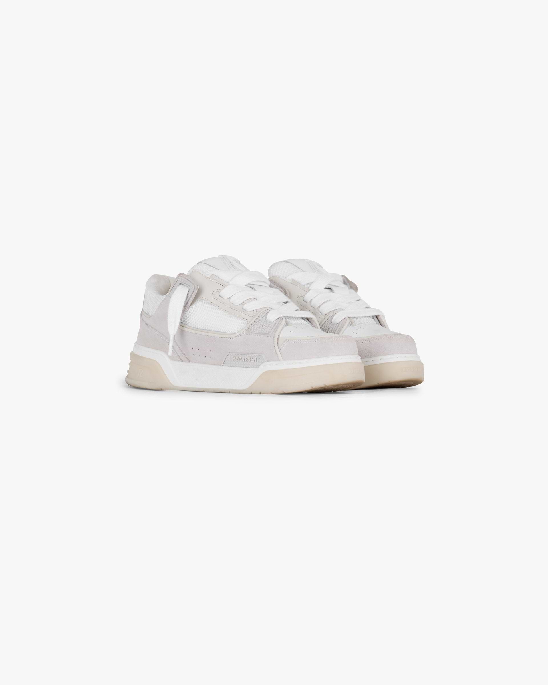 Back product image of a mens white sneaker on a plain white background | Studio Sneaker Mesh in Vintage White | Soft suede panelling with TPU trims | SS25 Footwear | Represent Clo