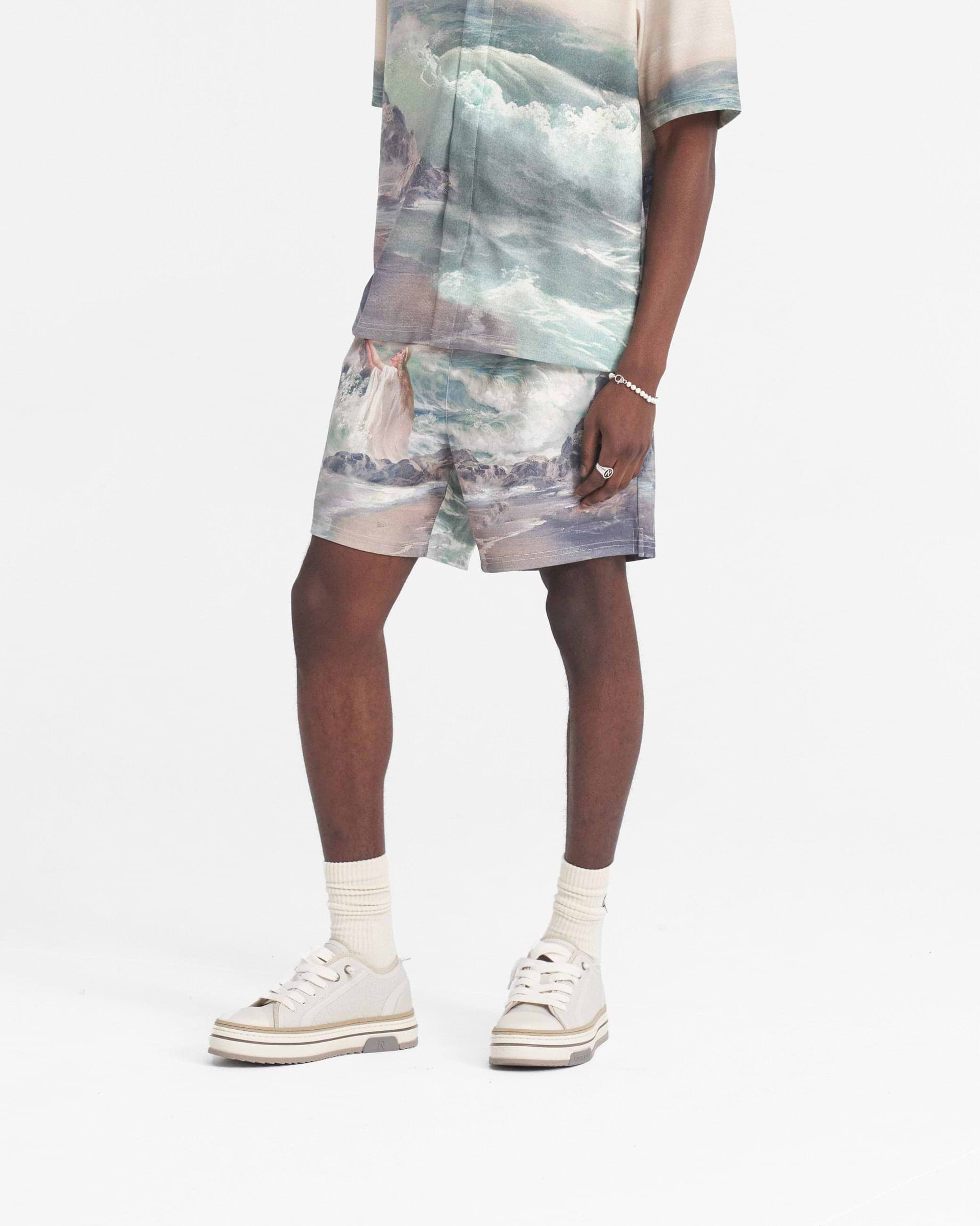 Back product image of mens white shorts on a plain white background | Higher Truth Short in Easel | Relaxed fit shorts with full artwork print | SS24 Shorts | Represent Clo