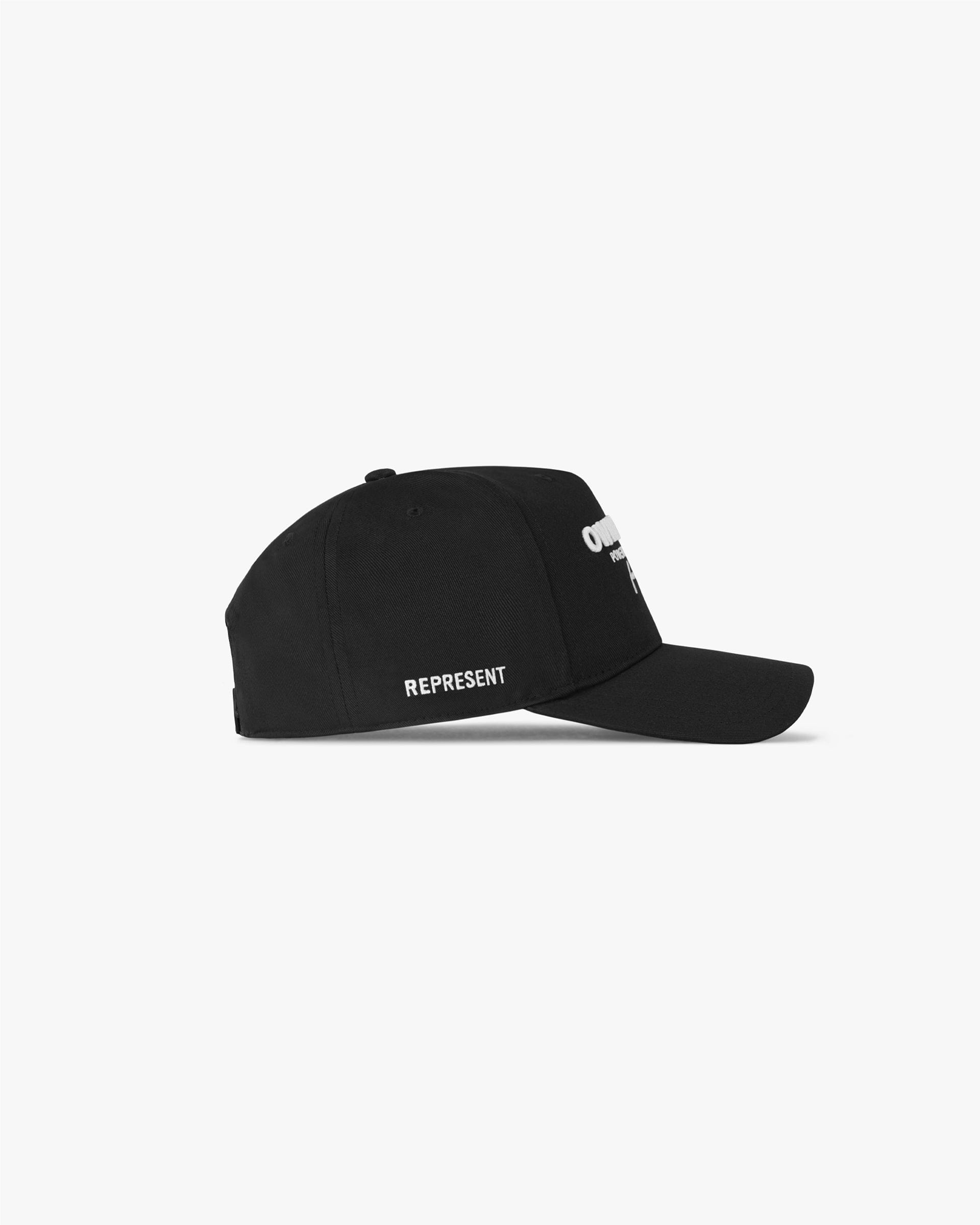 Back product image of a mens black cap on a plain white background | Represent Owners Club Cap in Black | Snapback cap with high build embroidered branding | Owners Club Accessories | Represent Clo