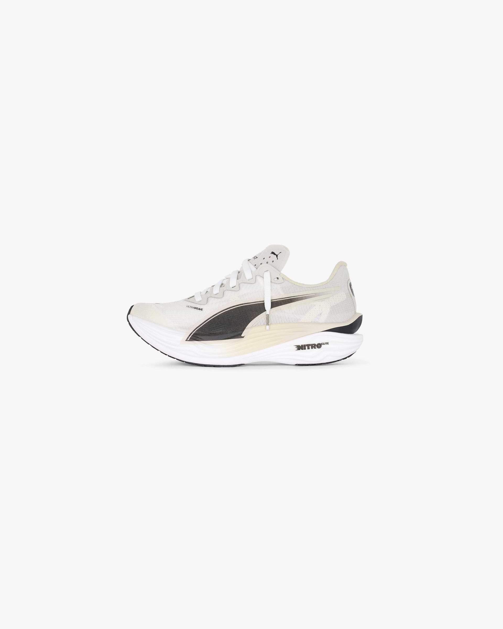 Front product image of womens beige footwear on a plain white background | 247 X Puma Deviate Nitro 3 Elite Women's in Desert Dust | Lightweight running shoes | 247 Footwear | Represent Clo