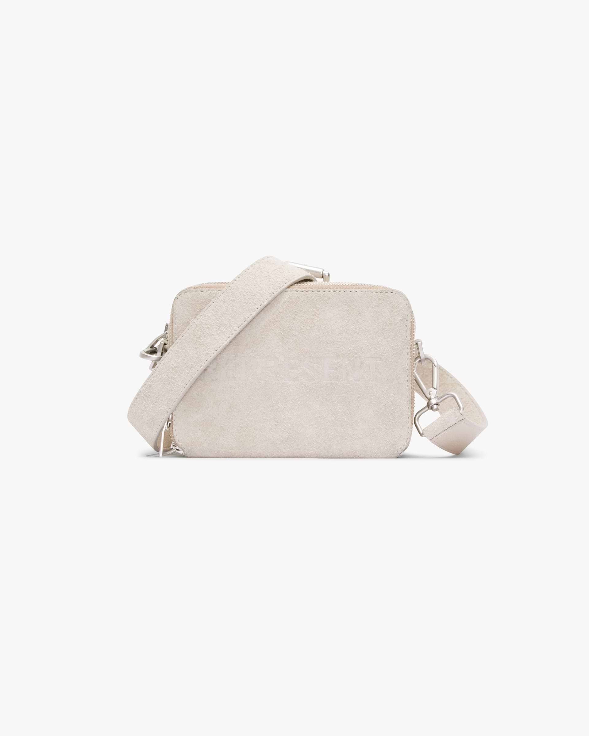 Front product image of a mens beige suede camera bag on a plain white background | Represent Hairy Suede Camera Bag in Cashmere | Suede camera bag with textured finish | SS24 Accessories | Represent Clo