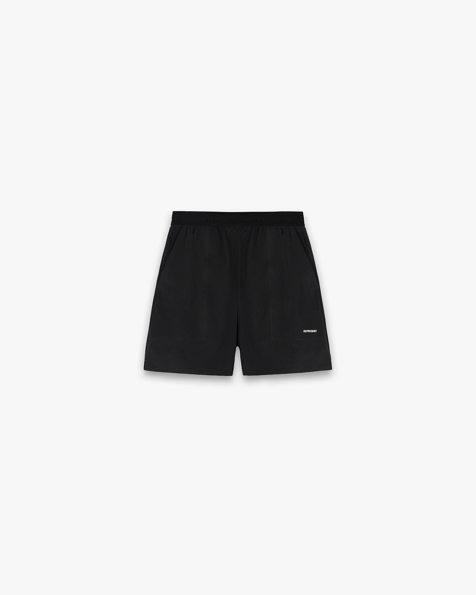 Front product image of mens black shorts on a plain white background | Team 247 Fused Shorts in Black | Swim shorts with elasticated waistband and mesh brief | 247 Shorts | Represent Clo
