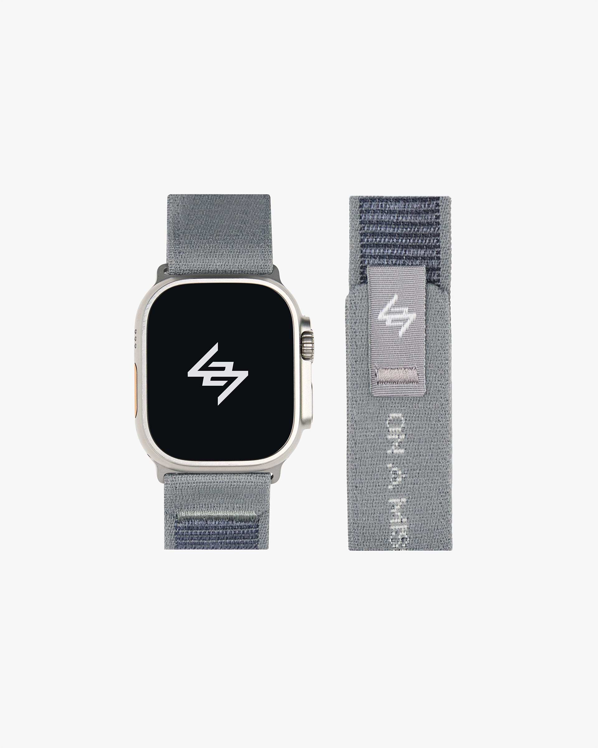 Back product image of a mens grey watch strap on a plain white background | 247 Apple Watch Strap in Titanium | Nylon weave watch strap with velcro fastener | 247 Accessories | Represent Clo