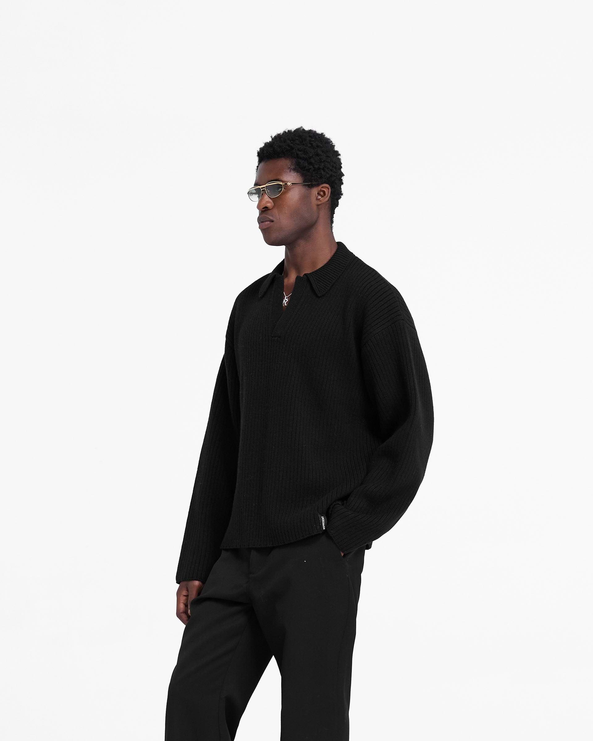 Back product image of a mens black polo on a plain white background | Ribbed Knit Polo in Jet Black | Wool blend open neck knitwear | FW24 Knitwear | Represent Clo