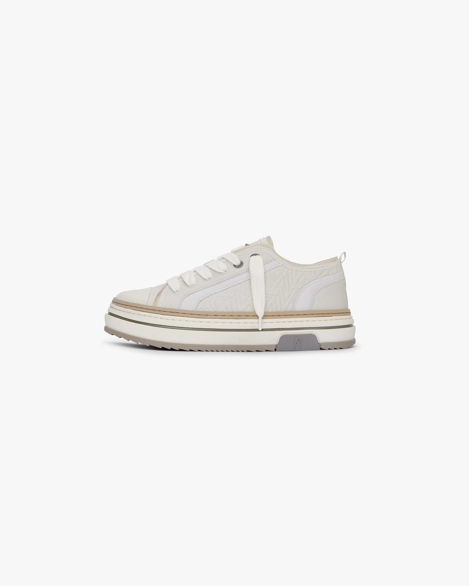 Mens white leather sneaker on a plain white background | HTN X Low in Vintage White | Luxury leather sneaker with embroidered detailing | SS24 Footwear | Represent Clo